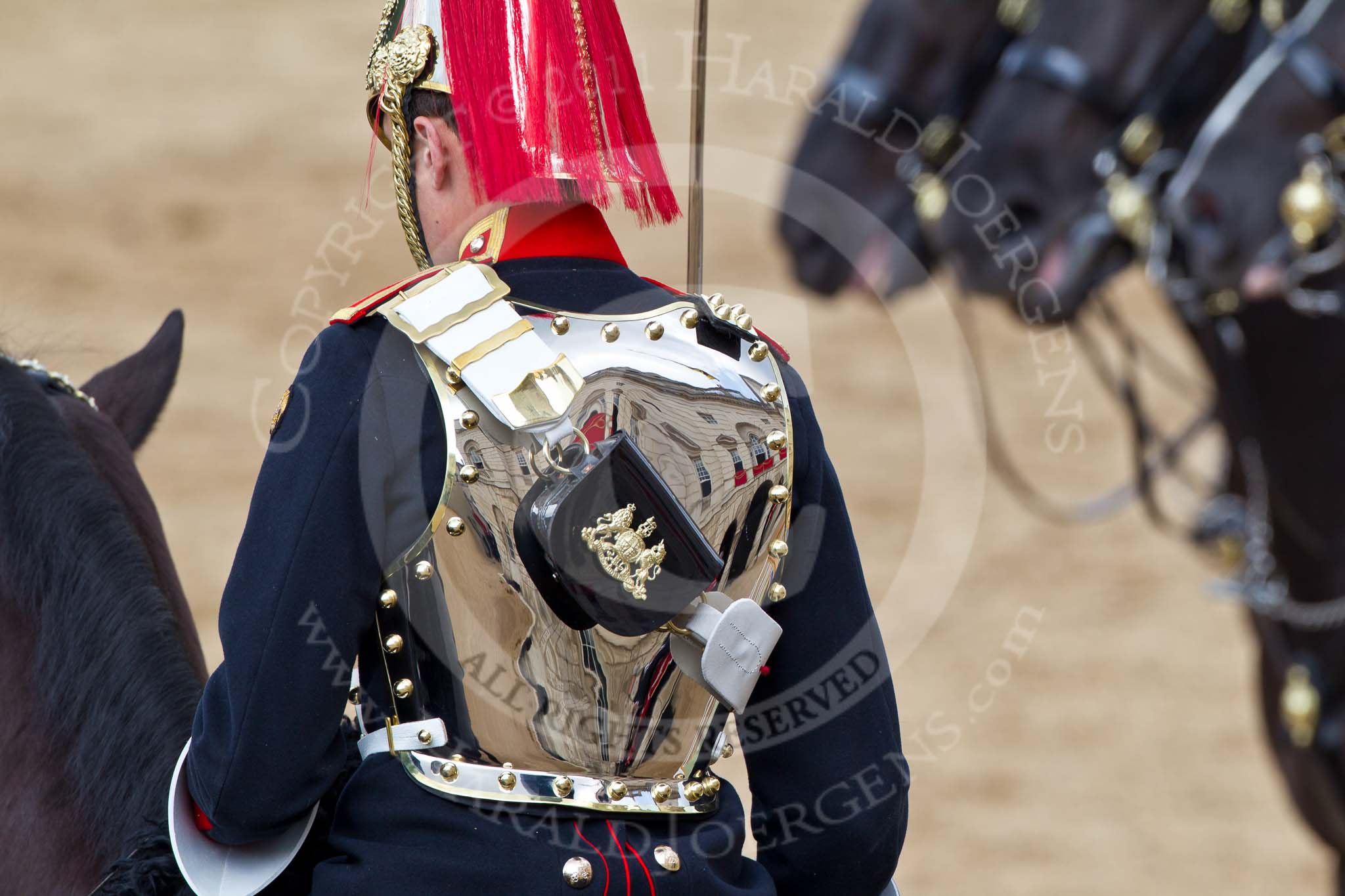 Trooping the Colour 2011: One of the four troopers of the Blues and Royals near the end of the Royal Procession during March Off. The reflection shows Horse Guards Building..
Horse Guards Parade, Westminster,
London SW1,
Greater London,
United Kingdom,
on 11 June 2011 at 12:12, image #429