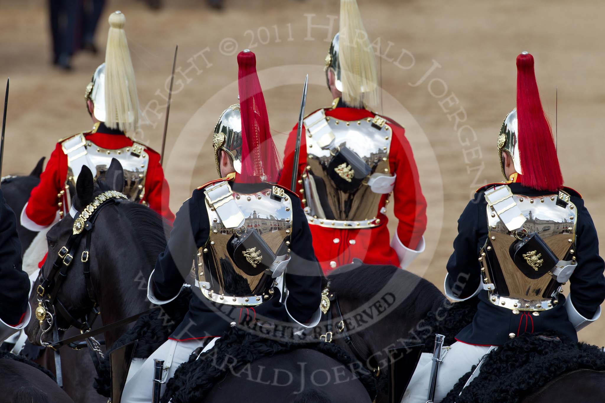 Trooping the Colour 2011: Four troopers of The Life Guards, and four troppers of The Blues and Royals (not all of them visible), leaving Horse Guards Parade towards The Mall at the end of the event..
Horse Guards Parade, Westminster,
London SW1,
Greater London,
United Kingdom,
on 11 June 2011 at 12:12, image #430