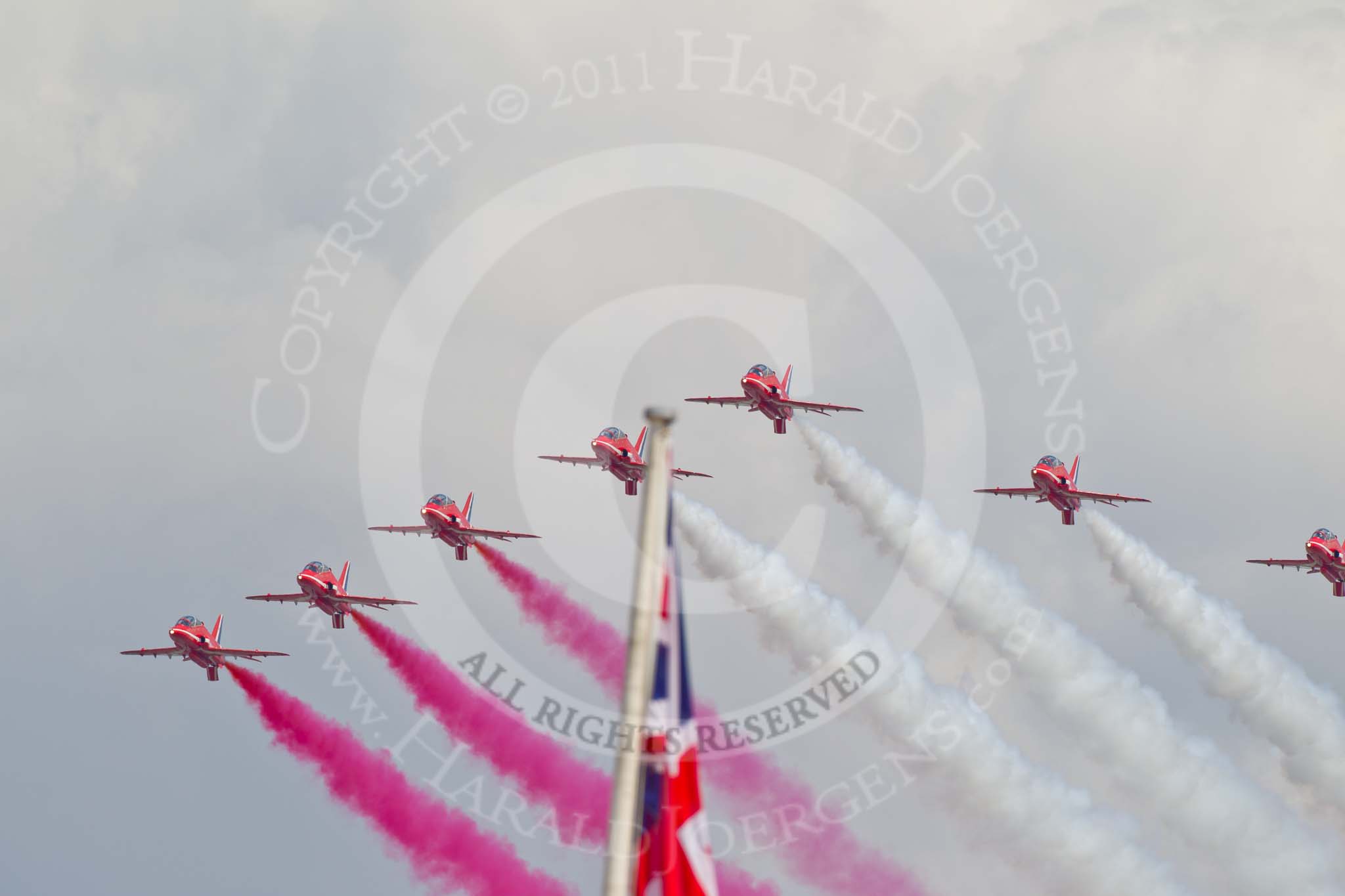 Photo 110611_130341_1D4_6847HaraldJoergens_ Trooping the Colour 2011: The Red Arrows, displaying red, white, and blue smoke from their Hawk aircraft, during the fly-past over Buckingham Palace..
Horse Guards Parade, Westminster,
London SW1,
Greater London,
United Kingdom,
on 11 June 2011 at 13:03, image #447