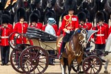Trooping the Colour 2011: HM The Queen, in the ivory mounted phaeton, during the Inspection of the Line. In the foreground the Field Officer of the parade, Lieuteant Colonel Lincoln P M Jopp, Scots Guards..
Horse Guards Parade, Westminster,
London SW1,
Greater London,
United Kingdom,
on 11 June 2011 at 11:03, image #156