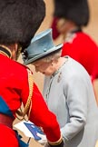 Trooping the Colour 2011: HM The Queen, back at the saluting base after the Inspection of the Line, about to take a seat, with the official programme of the parade in her hand..
Horse Guards Parade, Westminster,
London SW1,
Greater London,
United Kingdom,
on 11 June 2011 at 11:08, image #173