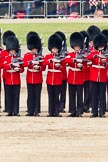 Trooping the Colour 2011: No. 2 Guard, B Company Scots Guards, about to present arms, as the Colour is trooped along the line of guards..
Horse Guards Parade, Westminster,
London SW1,
Greater London,
United Kingdom,
on 11 June 2011 at 11:28, image #216