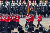 Trooping the Colour 2011: The Escort to the Colour, 1st Battalion Scots Guards, during the March Past in slow time. Carrying the Colour, the Ensign, Tom Ogilvy, on his left Colour Sergeant Chris Millin. In the background the Household Cavalry, here the Blues and Royals..
Horse Guards Parade, Westminster,
London SW1,
Greater London,
United Kingdom,
on 11 June 2011 at 11:50, image #300