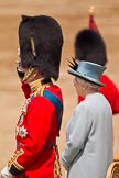 Trooping the Colour 2011: HRH Prince Philip, The Duke of Edinburgh, and HM The Queen standing on the saluting base during the March Past, Prince Philip saluting..
Horse Guards Parade, Westminster,
London SW1,
Greater London,
United Kingdom,
on 11 June 2011 at 12:02, image #381