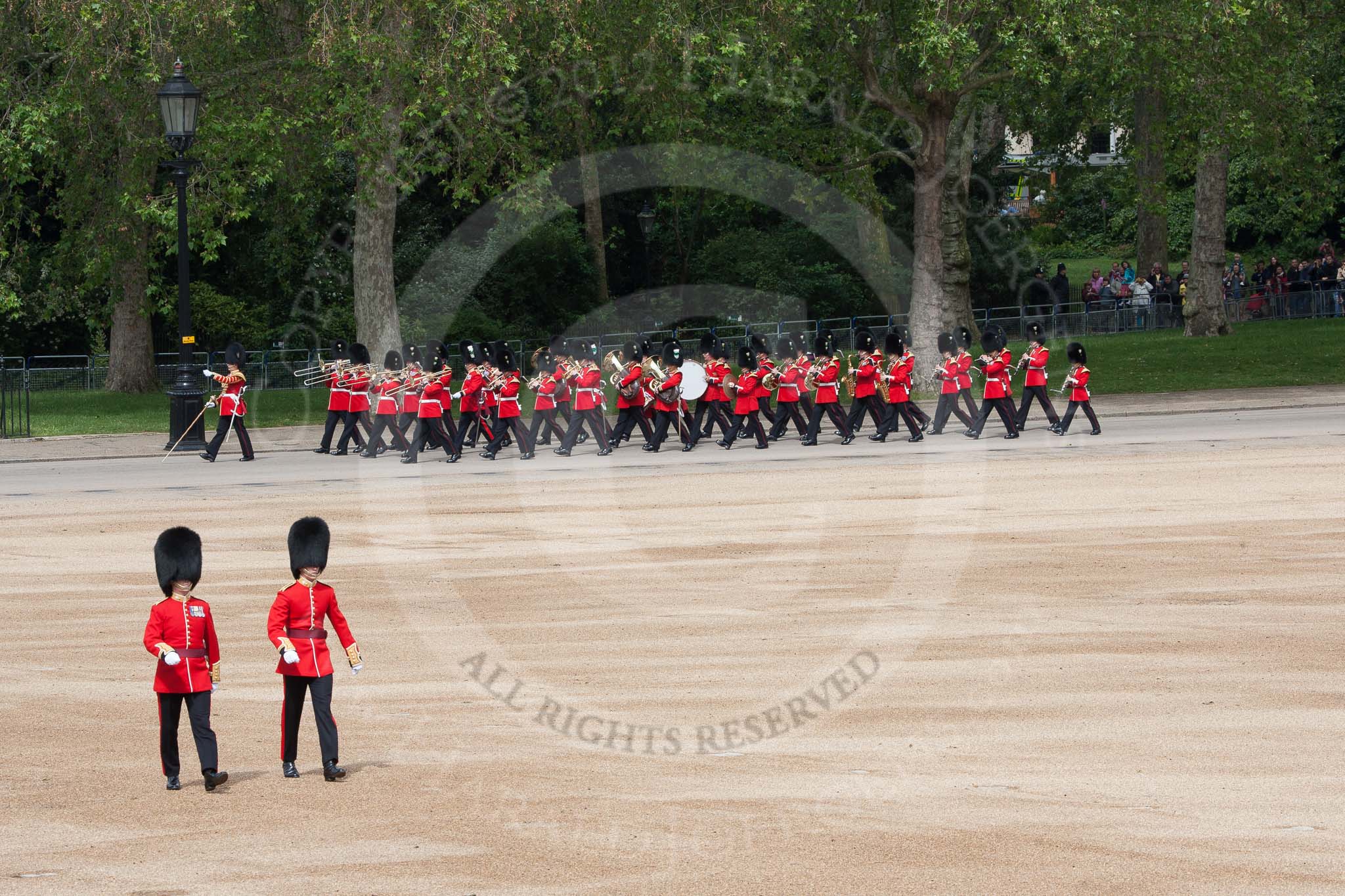 The Colonel's Review 2012: The Band of the Welsh Guards marching along the St James's Park side of Horse Guards Parade, led by Senior Drum Major M Betts, Grenadier Guards. In the foreground an Ensign and a Subaltern of No. 4 Guard, Nijmegen Company Grenadier Guards.
Horse Guards Parade, Westminster,
London SW1,

United Kingdom,
on 09 June 2012 at 10:10, image #16