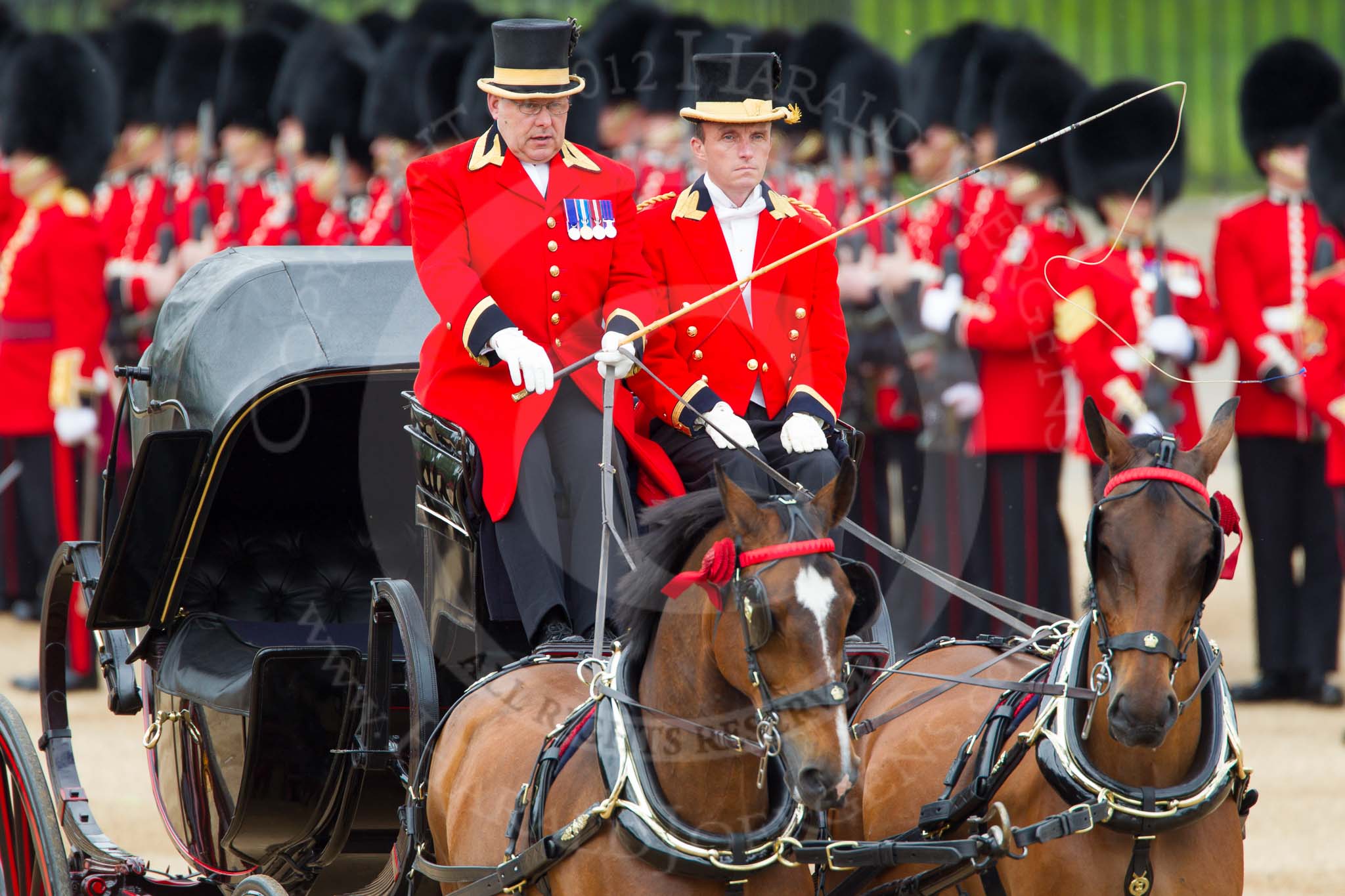 The Colonel's Review 2012: The coachmen with the first carriage that would be carrying members of the Royal family during the "real" parade..
Horse Guards Parade, Westminster,
London SW1,

United Kingdom,
on 09 June 2012 at 10:49, image #122
