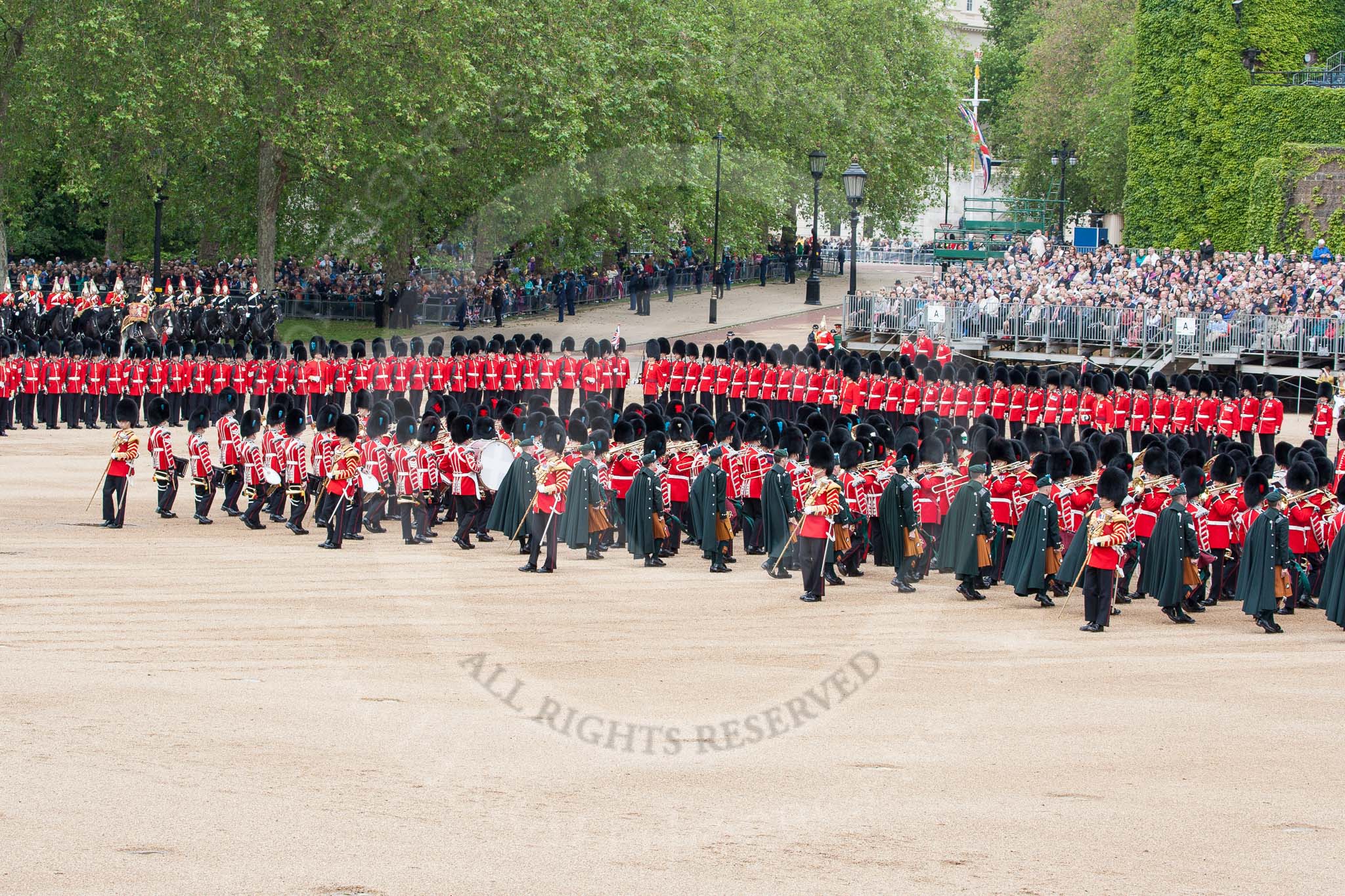 The Colonel's Review 2012: Massed Bands marching during the Massed Bands Troop.
 The bands change direction, so the Drum Majors are already marching towards the left, when the last musicians are still marching towards the right..
Horse Guards Parade, Westminster,
London SW1,

United Kingdom,
on 09 June 2012 at 11:08, image #218