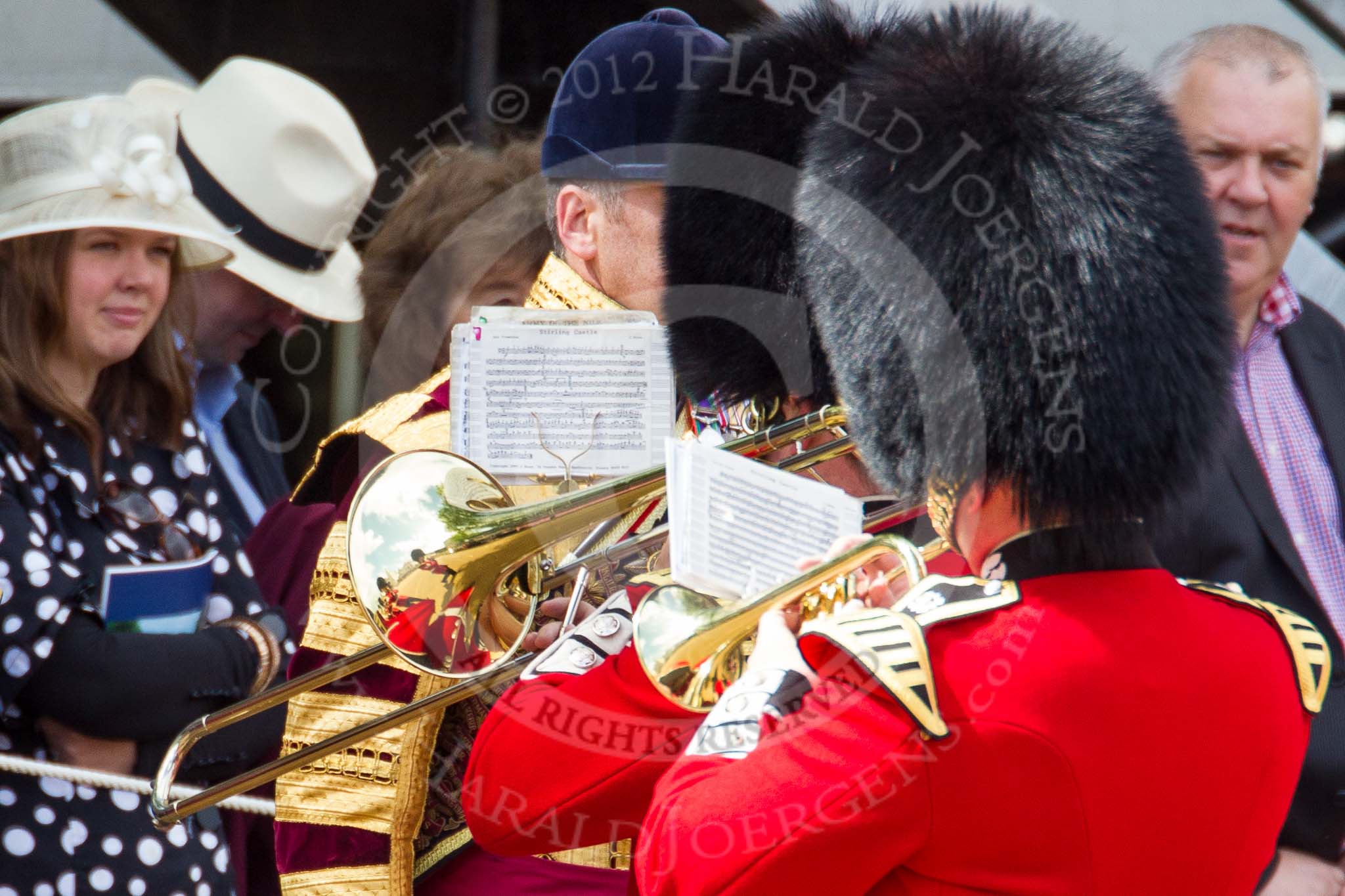 Trooping the Colour 2012: Lots of detail in the reflection of the Band of the Scots Guards seen o the instrument..
Horse Guards Parade, Westminster,
London SW1,

United Kingdom,
on 16 June 2012 at 10:18, image #37