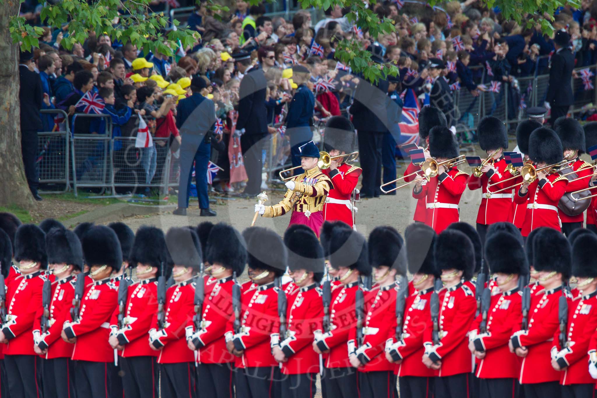 Trooping the Colour 2012: The Band of the Coldstream Guards arriving, with Drum Major Scott Fitzgerald, Coldstream Guards. They are here passing No. 5 Guard, 1st Battalion Irish Guards..
Horse Guards Parade, Westminster,
London SW1,

United Kingdom,
on 16 June 2012 at 10:29, image #66