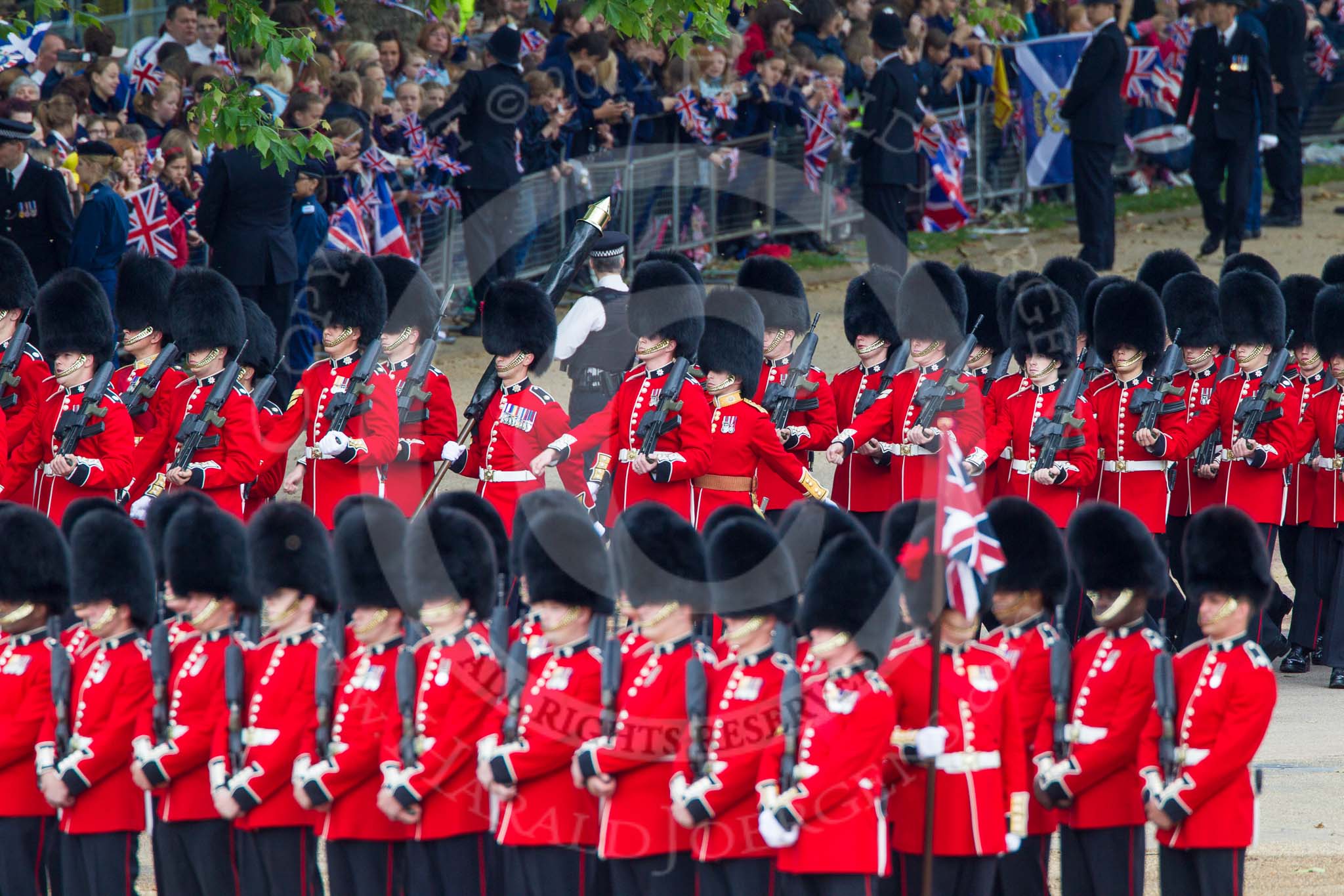 Trooping the Colour 2012: No. 1 Guard (Escort for the Colour), 1st Battalion Coldstream Guards, arriving at Horse Guards Parade. In the centre the Colour Sergeant Paul Baines MC, carrying the encased Colour..
Horse Guards Parade, Westminster,
London SW1,

United Kingdom,
on 16 June 2012 at 10:30, image #69