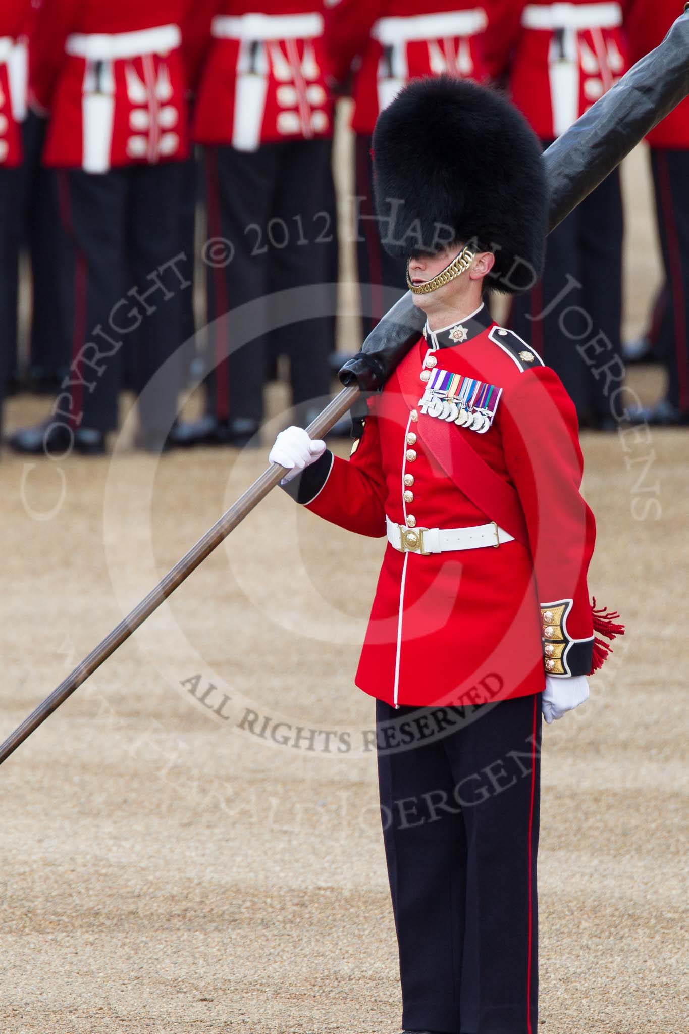 Photo 1206161031361D42753HaraldJoergens Trooping the Colour 2012: A closer look at Colour Sereant Paul Baines, carrying the Colour. Paul Baines is wearing the Military Cross he received for bravery whilst serving in Afghanistan..
Horse Guards Parade, Westminster,
London SW1,
United Kingdom,
on 16 June 2012 at 10:31, image #73