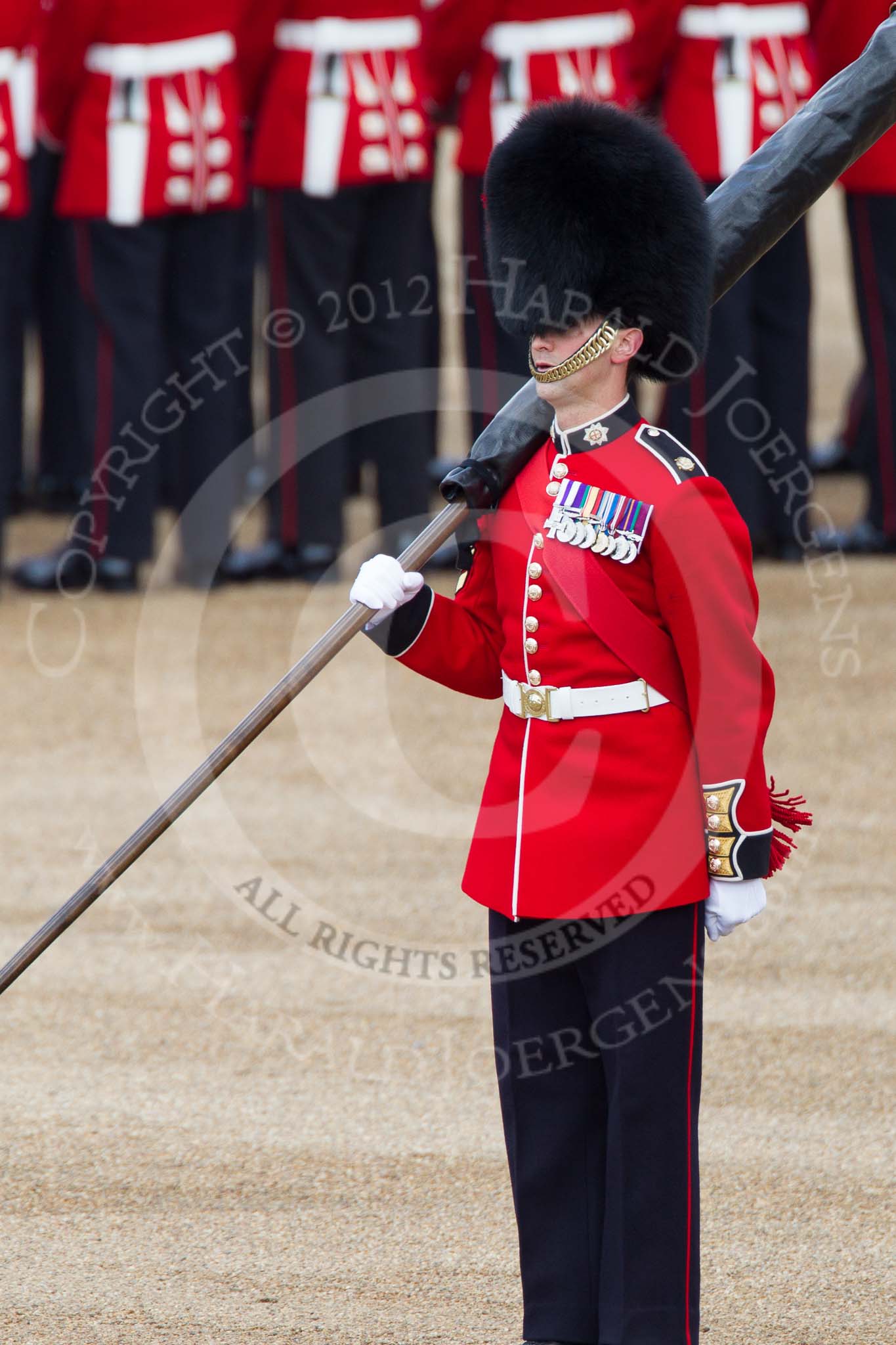 Trooping the Colour 2012: A closer look at Colour Sereant Paul Baines, carrying the Colour. Paul Baines is wearing the Military Cross he received for bravery whilst serving in Afghanistan..
Horse Guards Parade, Westminster,
London SW1,

United Kingdom,
on 16 June 2012 at 10:31, image #73