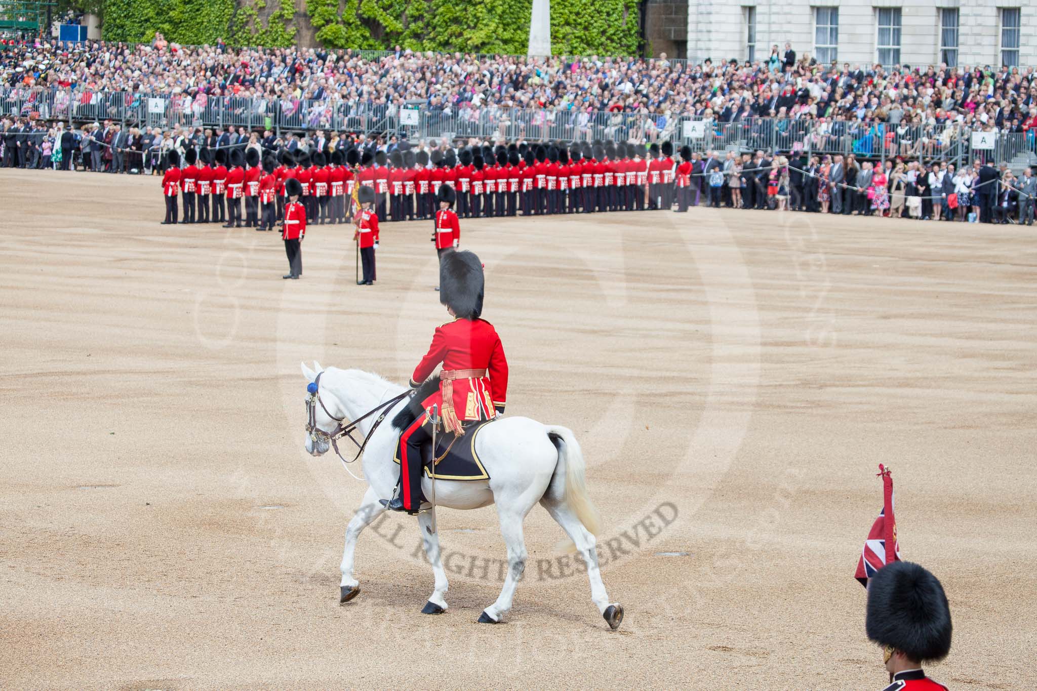 Trooping the Colour 2012: The Adjutant of the Parade, Captain F O B Wells, Coldstream Guards, is riding onto Horse Guards Parade. On the right the Colour Party..
Horse Guards Parade, Westminster,
London SW1,

United Kingdom,
on 16 June 2012 at 10:34, image #82