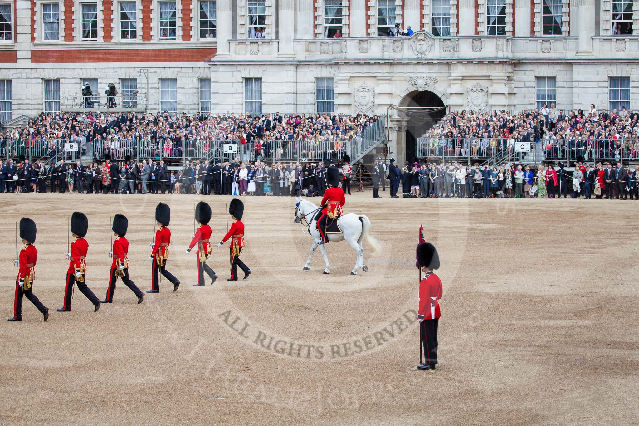 Trooping the Colour 2012: Subalterns and Ensigns of all guards divisions marching back to their guards, together with the Adjutant of the Parade..
Horse Guards Parade, Westminster,
London SW1,

United Kingdom,
on 16 June 2012 at 10:39, image #100