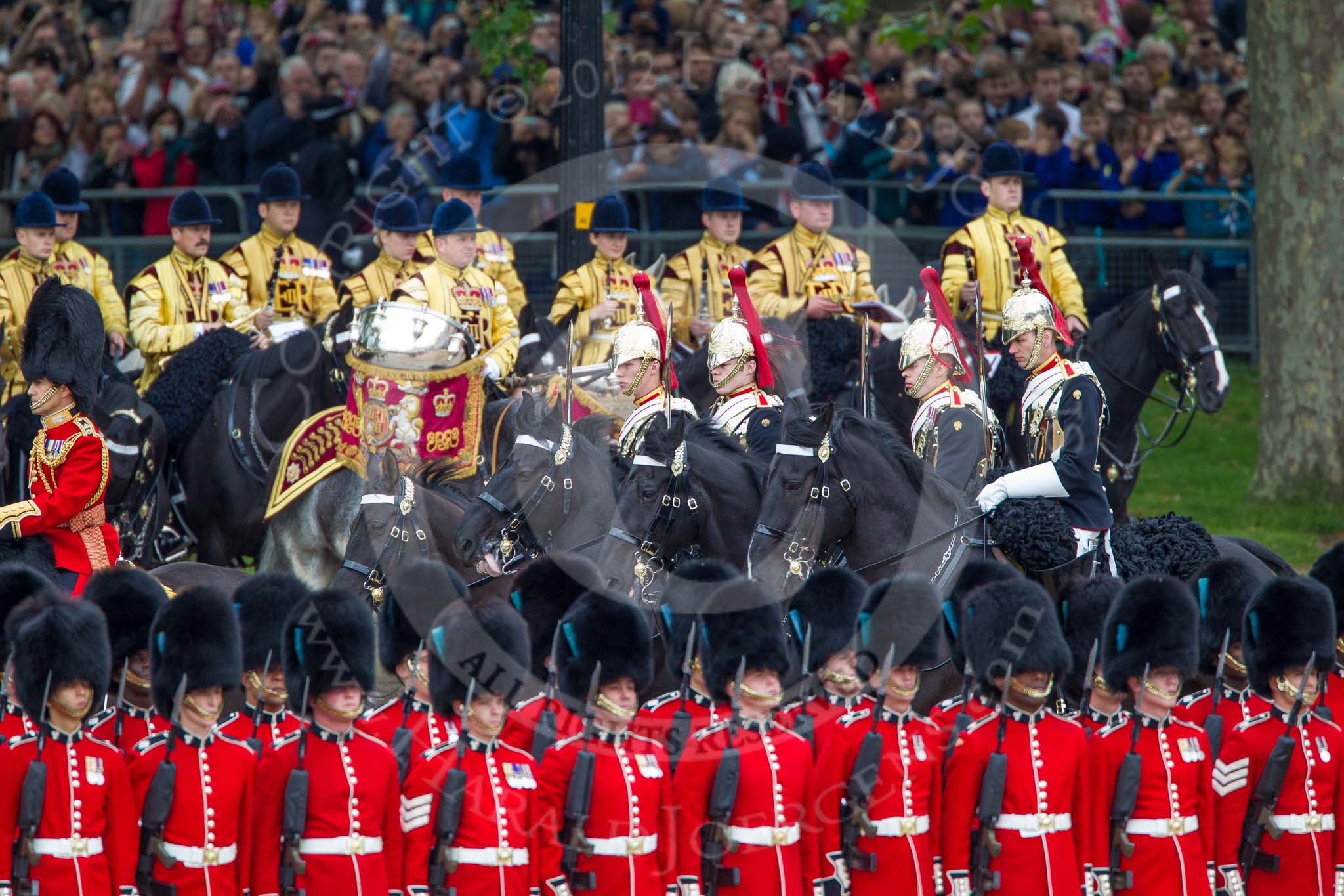 Trooping the Colour 2012: The four Troopers from the Blues and Royal following Andrew Speed as the head of the Royal Procession during the Inspection of the Line. In front No. 5 Guard, behind them the Mounted Bands of the Household Cavalry..
Horse Guards Parade, Westminster,
London SW1,

United Kingdom,
on 16 June 2012 at 11:05, image #227