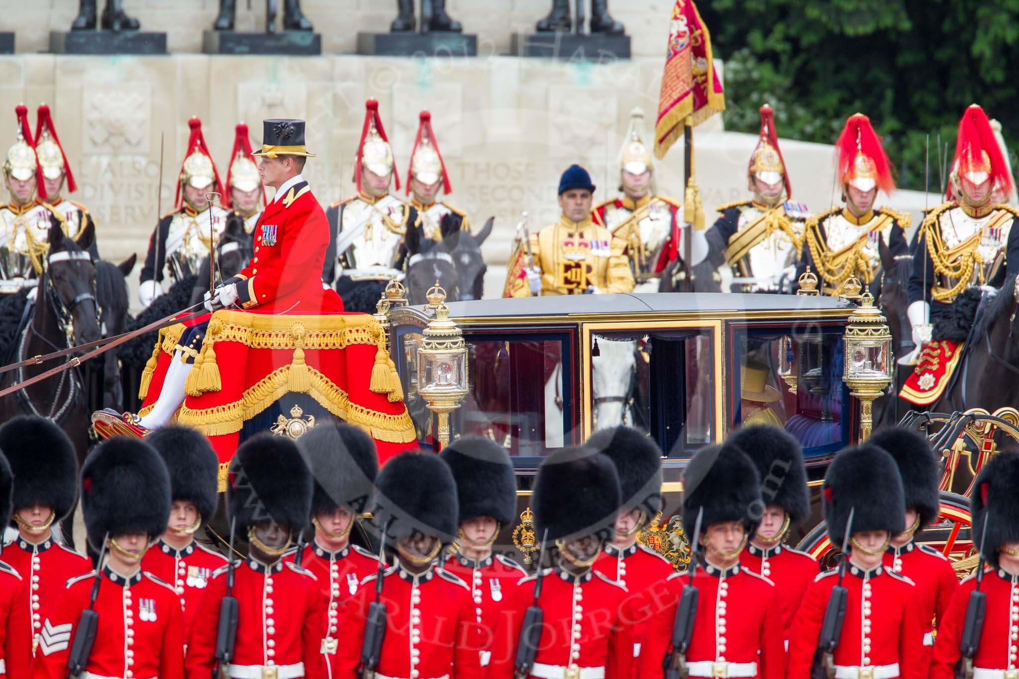 Trooping the Colour 2012: The Inspection of the Line - HM The Queen in the Glass Carriage passing the Trumpeter, Standard Bearer and Standard Coverer in front of the Guards Memorial..
Horse Guards Parade, Westminster,
London SW1,

United Kingdom,
on 16 June 2012 at 11:06, image #229