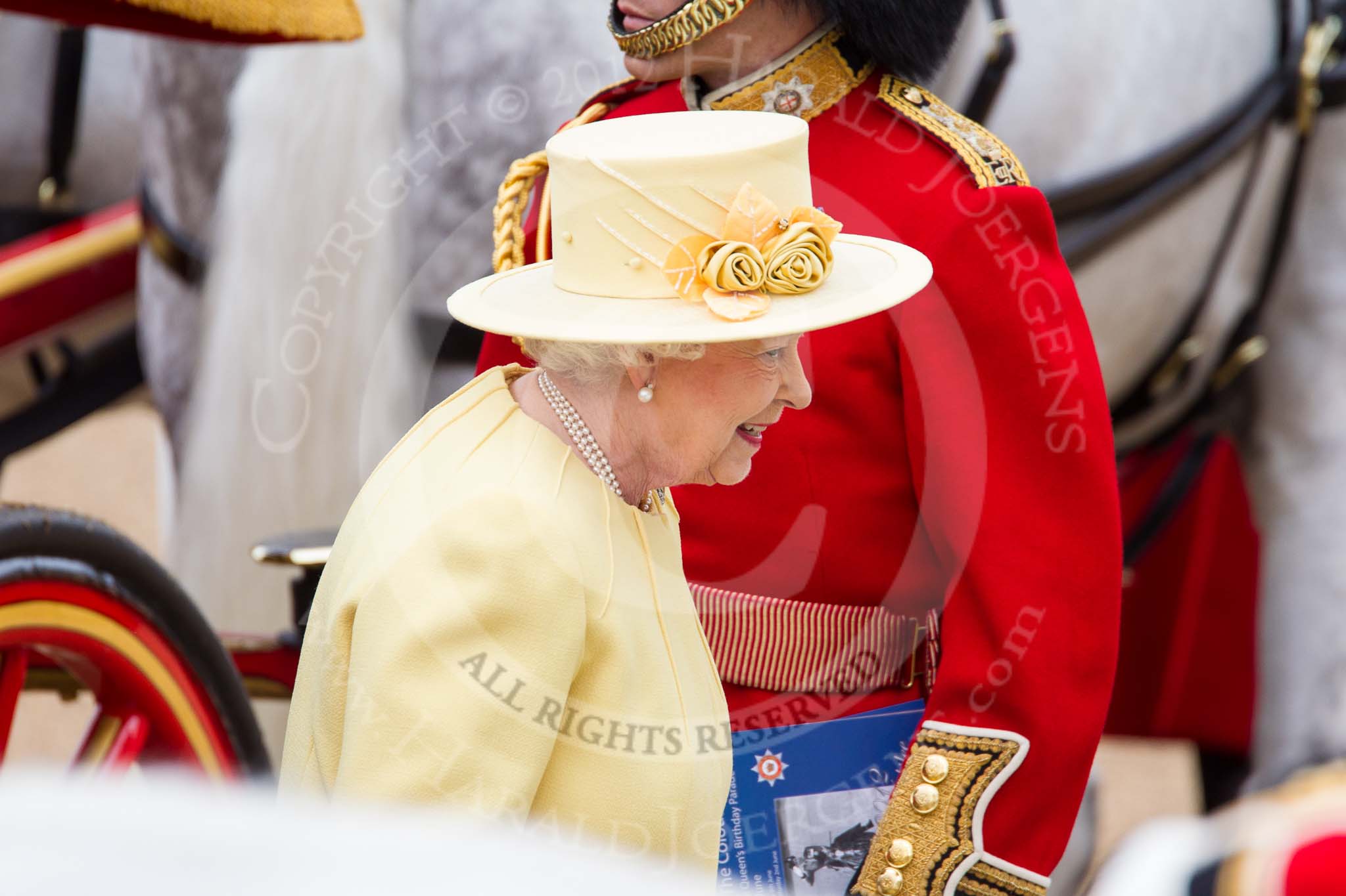 Trooping the Colour 2012: HM The Queen leaving the Glass Coach, after the Inspection of the Line, to step onto the saluting base..
Horse Guards Parade, Westminster,
London SW1,

United Kingdom,
on 16 June 2012 at 11:08, image #250
