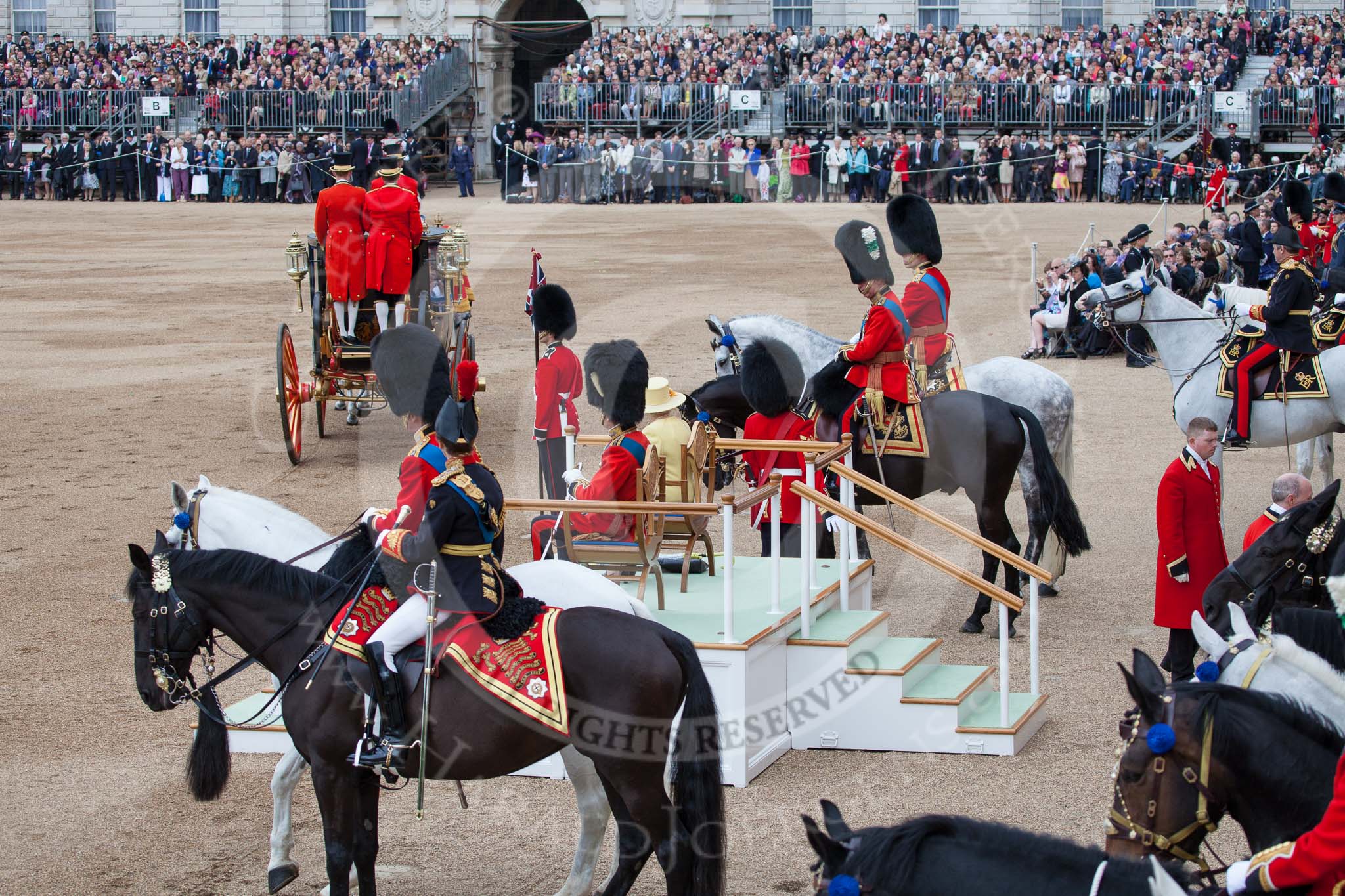 Photo 1206161108525D26005HaraldJoergens Trooping the Colour 2012: After the Inspection of the Line - the Glass Coach is leaving. In front HRH The Princess Royal and HRH The Duke of Kent, on the right of the saluting base HRH The Prince of Wales, in conversation with GSM B Mott, and HRH The Duke of Cambridge..
Horse Guards Parade, Westminster,
London SW1,
United Kingdom,
on 16 June 2012 at 11:08, image #255