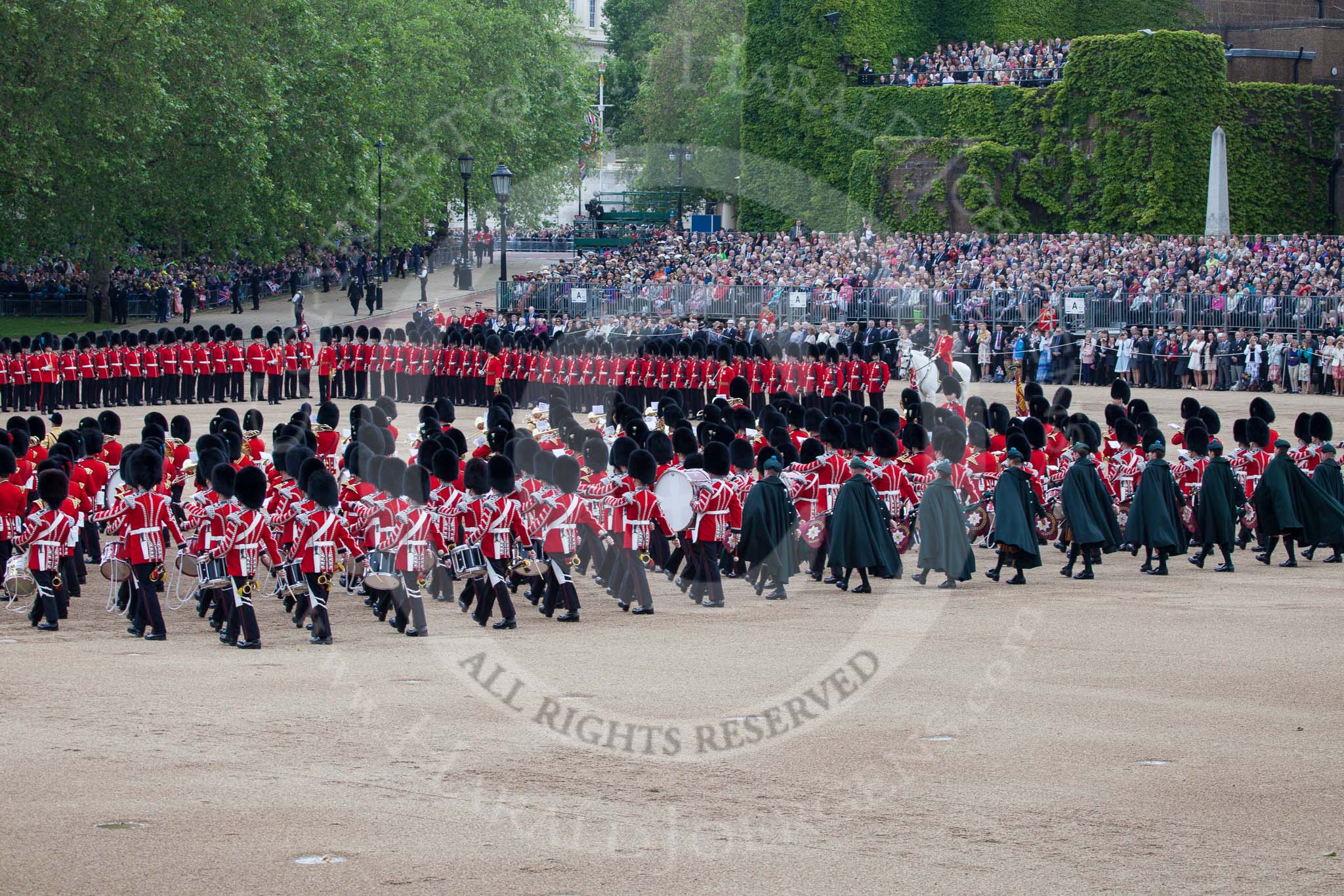 Trooping the Colour 2012: The Massed Bands Troop, before the Collection of the Colour. The bands hand changed direction, and are now marching towards the line of guardsmen..
Horse Guards Parade, Westminster,
London SW1,

United Kingdom,
on 16 June 2012 at 11:18, image #295