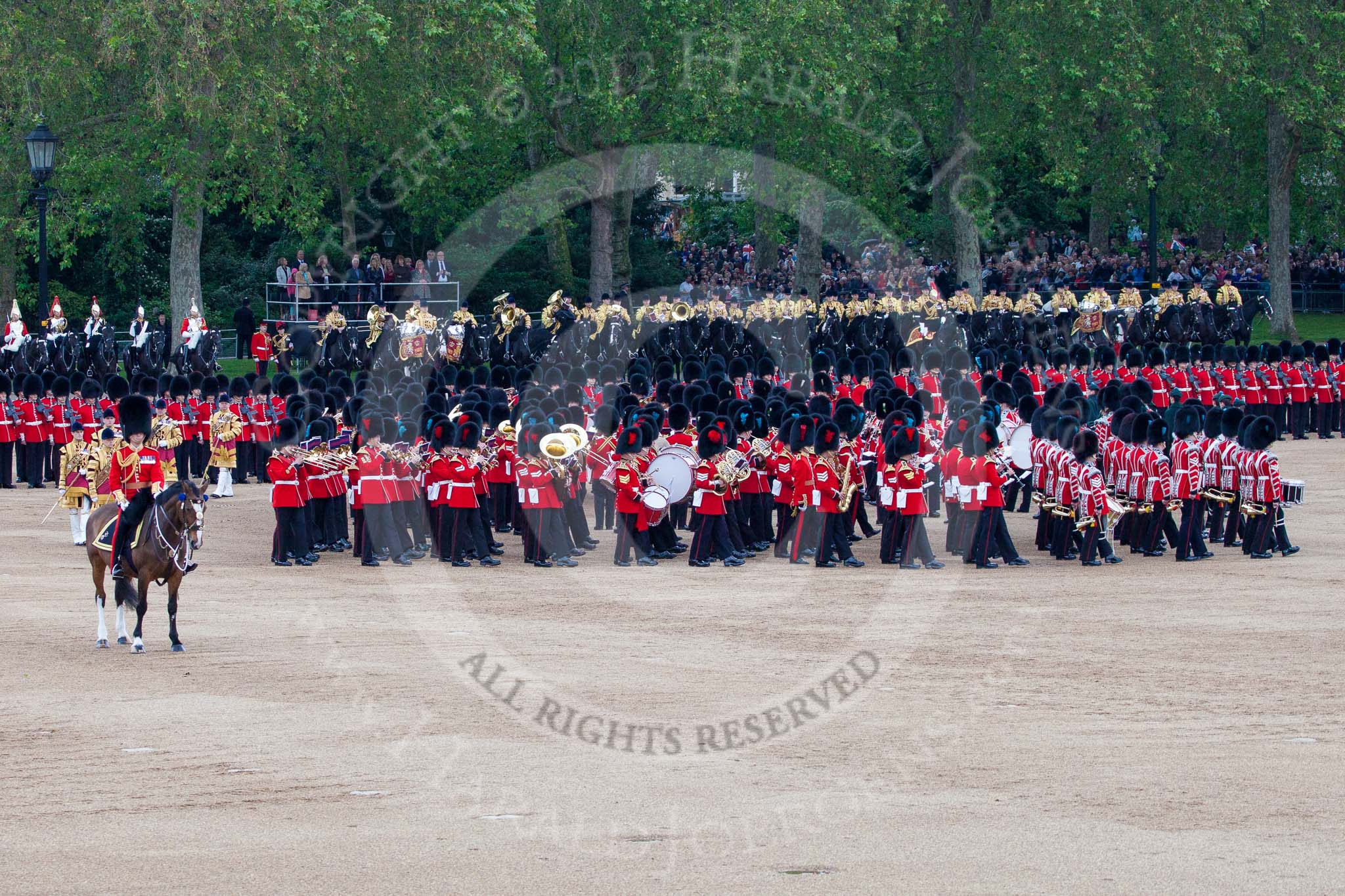 Trooping the Colour 2012: The Massed Bands performimg the legendary "spin wheel" - they need to turn 90 degrees to the left, but haven't got the space to do it in any other way..
Horse Guards Parade, Westminster,
London SW1,

United Kingdom,
on 16 June 2012 at 11:23, image #327