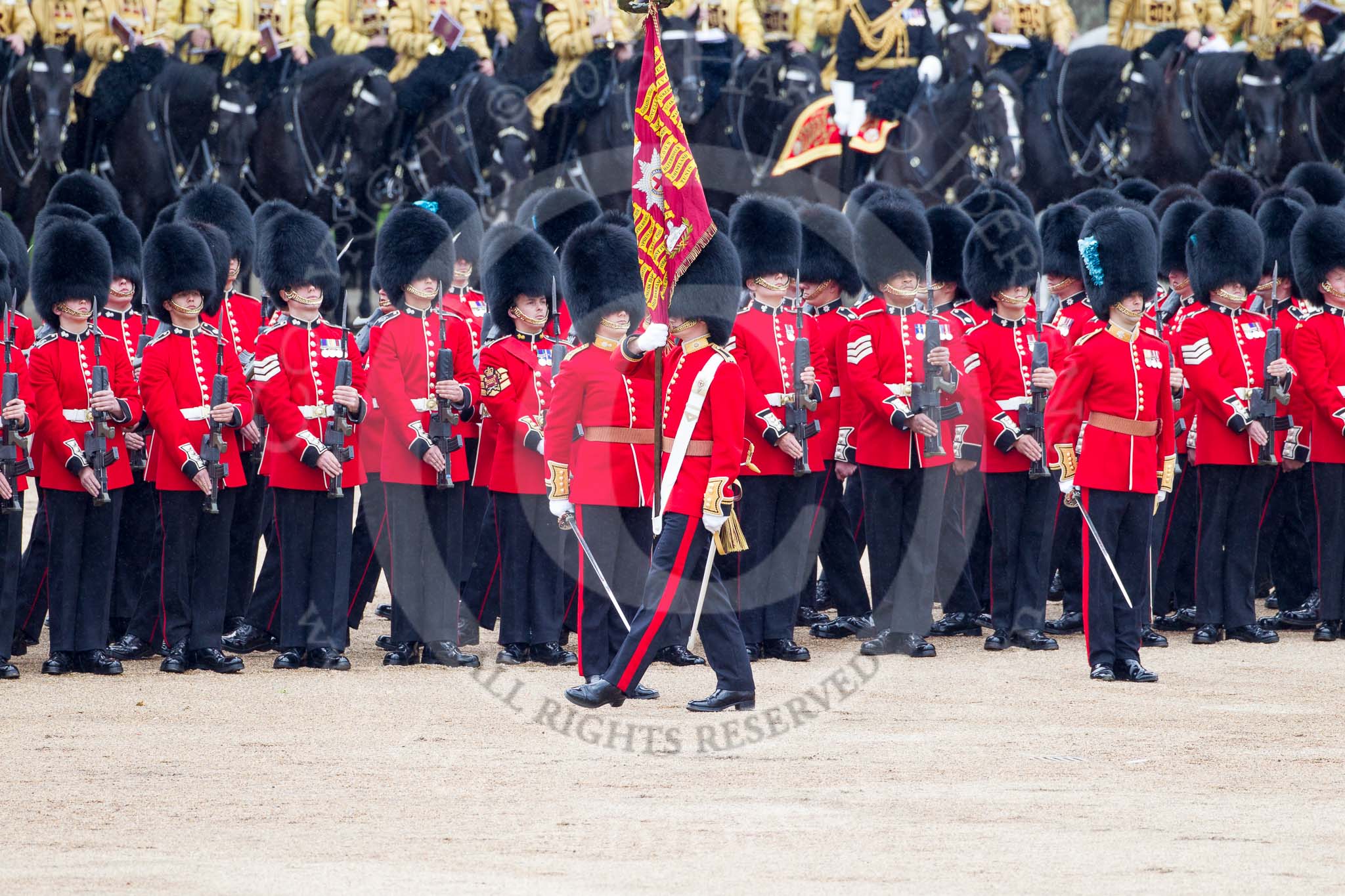 Trooping the Colour 2012: The Ensign, Second Lieutenant Hugo C Codrington, is trooping the Colour along No. 5 Guard, 1st Battalion Irish Guards, towards No. 4 Guard, Nijmegen Company Grenadier Guards..
Horse Guards Parade, Westminster,
London SW1,

United Kingdom,
on 16 June 2012 at 11:26, image #349