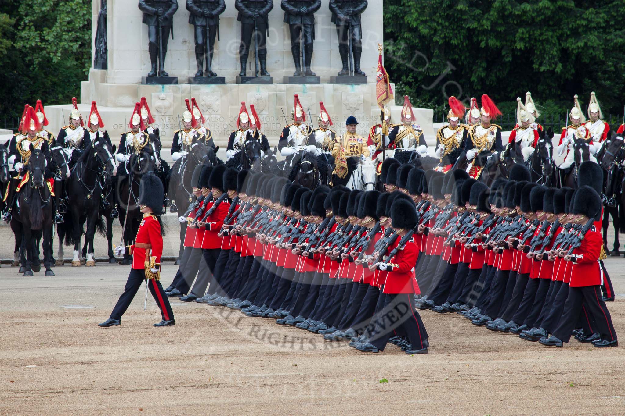 Trooping the Colour 2012: No. 6 Guard, F Company Scots Guards, lead by Major A R Guthrie, marching in front of the Guards Memorial during the March Past..
Horse Guards Parade, Westminster,
London SW1,

United Kingdom,
on 16 June 2012 at 11:33, image #388