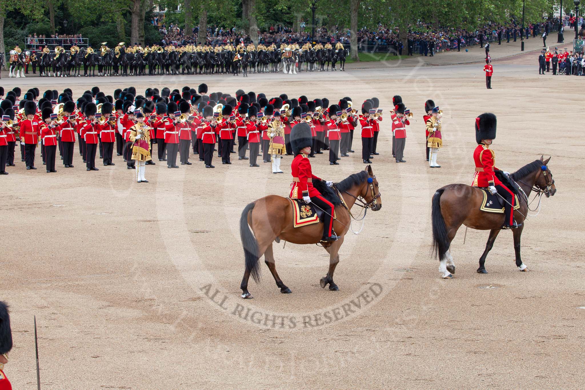Trooping the Colour 2012: Riding past Her Majesty - the Major of the Parade, Major Mark Lewis, Welsh Guards, and the Field Officer, Lieutenant Colonel R C N Sergeant, Coldstream Guards, during the March Past..
Horse Guards Parade, Westminster,
London SW1,

United Kingdom,
on 16 June 2012 at 11:36, image #417