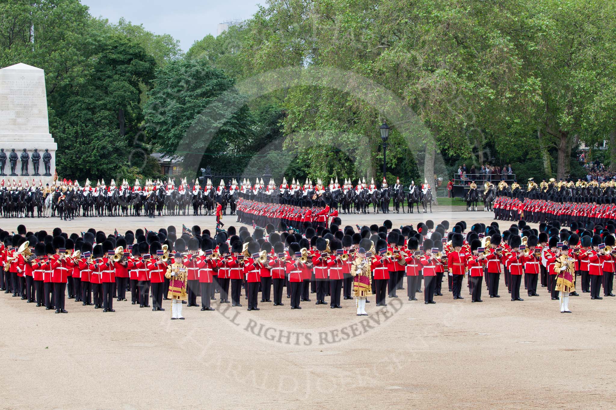 Trooping the Colour 2012: The March Past: No. 2 Guard, 1st Battalion Coldstream Guards,and No. 3 Guard, No. 7 Company, Coldstream Guard, marching between the Household Cavalry on the St.  James's Park side of Horse Guards Parade, and the Massed Bands in the centre..
Horse Guards Parade, Westminster,
London SW1,

United Kingdom,
on 16 June 2012 at 11:42, image #470