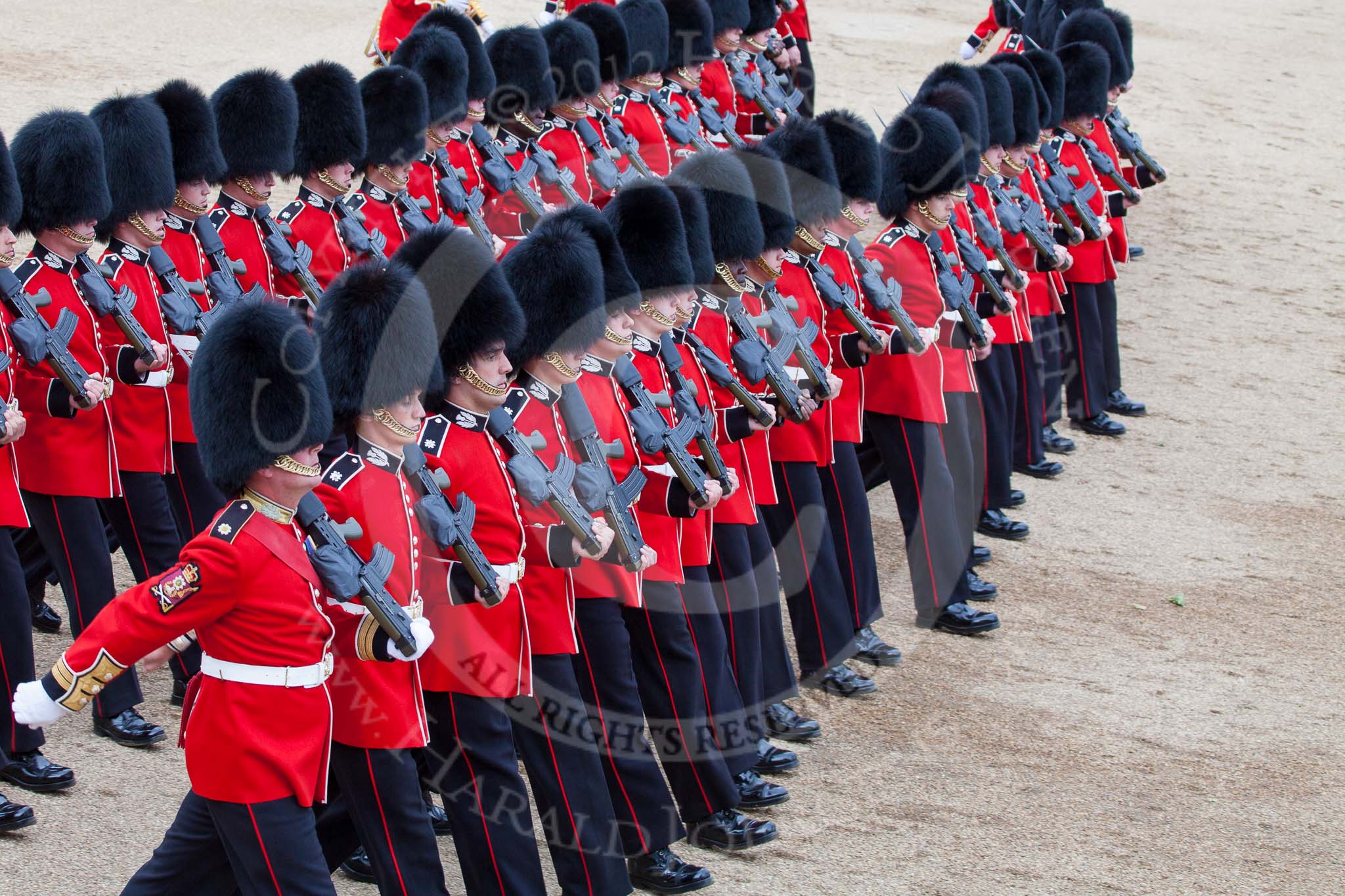 Trooping the Colour 2012: The March Past in Quick Time, here No. No. 6 Guard, F Company Scots Guards..
Horse Guards Parade, Westminster,
London SW1,

United Kingdom,
on 16 June 2012 at 11:46, image #498