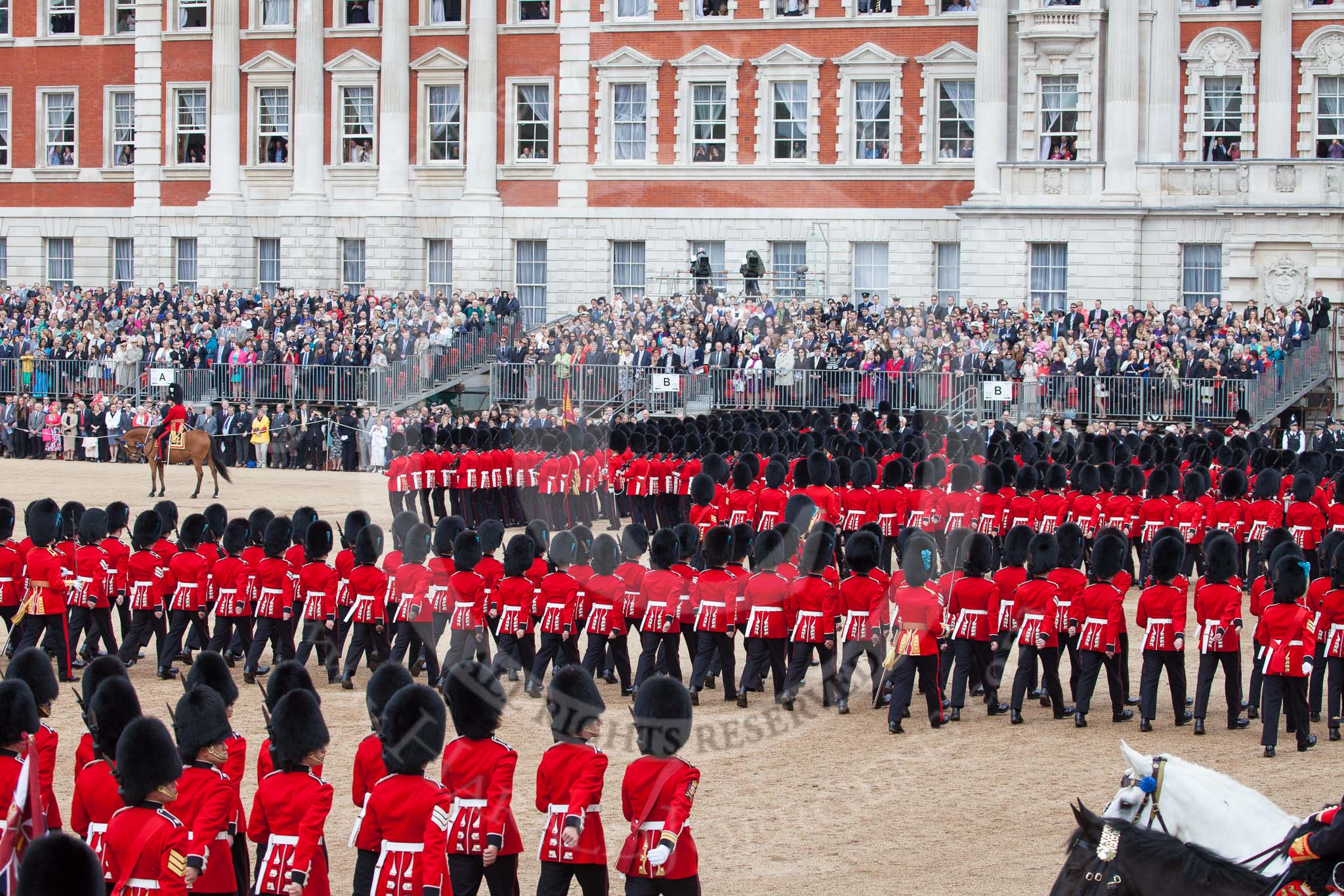 Trooping the Colour 2012: The March Past in Quick Time, the guards divisions turning left again in front of the Old Admirality Building..
Horse Guards Parade, Westminster,
London SW1,

United Kingdom,
on 16 June 2012 at 11:47, image #500