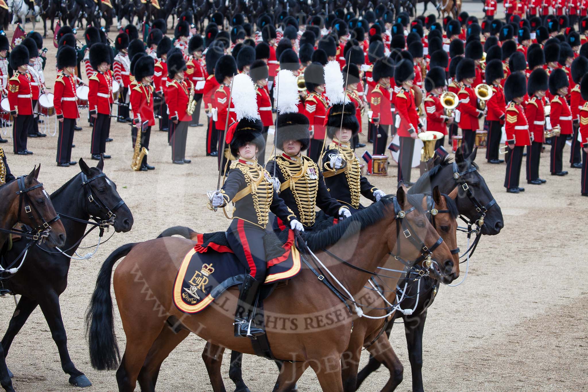 Trooping the Colour 2012: The Ride Past - Officers from the Royal Horse Artillery, satuting..
Horse Guards Parade, Westminster,
London SW1,

United Kingdom,
on 16 June 2012 at 11:54, image #543