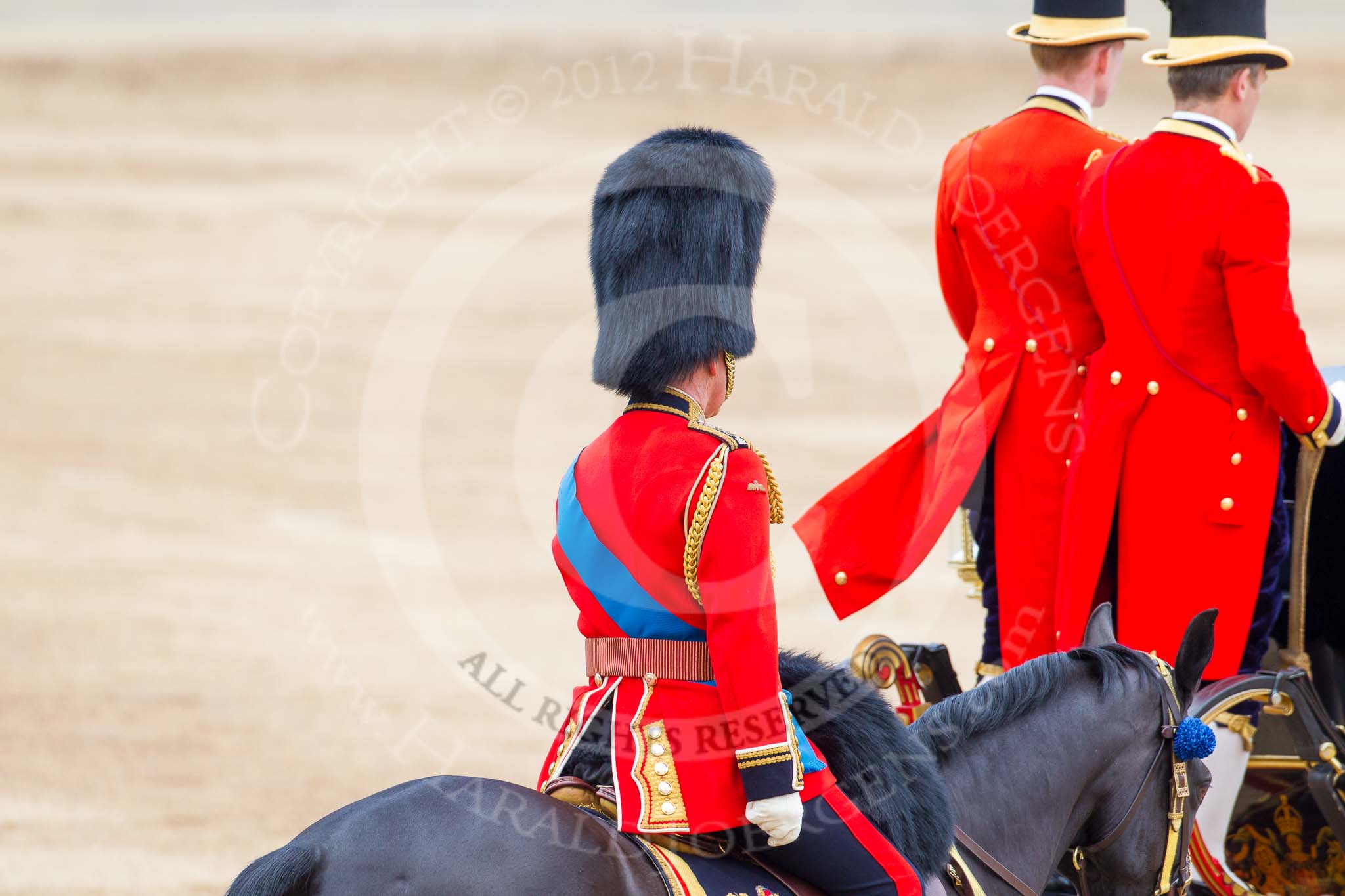 Photo 1206161211551D45145HaraldJoergens Trooping the Colour 2012: HRH The Prince of Wales at the end of the parade following the Glass Coach with the two liveried grooms standing at the rear..
Horse Guards Parade, Westminster,
London SW1,
United Kingdom,
on 16 June 2012 at 12:11, image #670