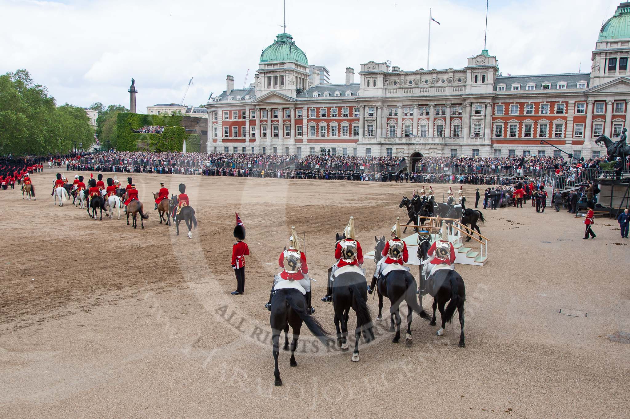 Trooping the Colour 2012: The March Off - members of the Royal Procession on the left of the image, in front the four troopers from The Life Guards, at the right of the saluting base the four troopers from The Blues and Royals..
Horse Guards Parade, Westminster,
London SW1,

United Kingdom,
on 16 June 2012 at 12:13, image #683