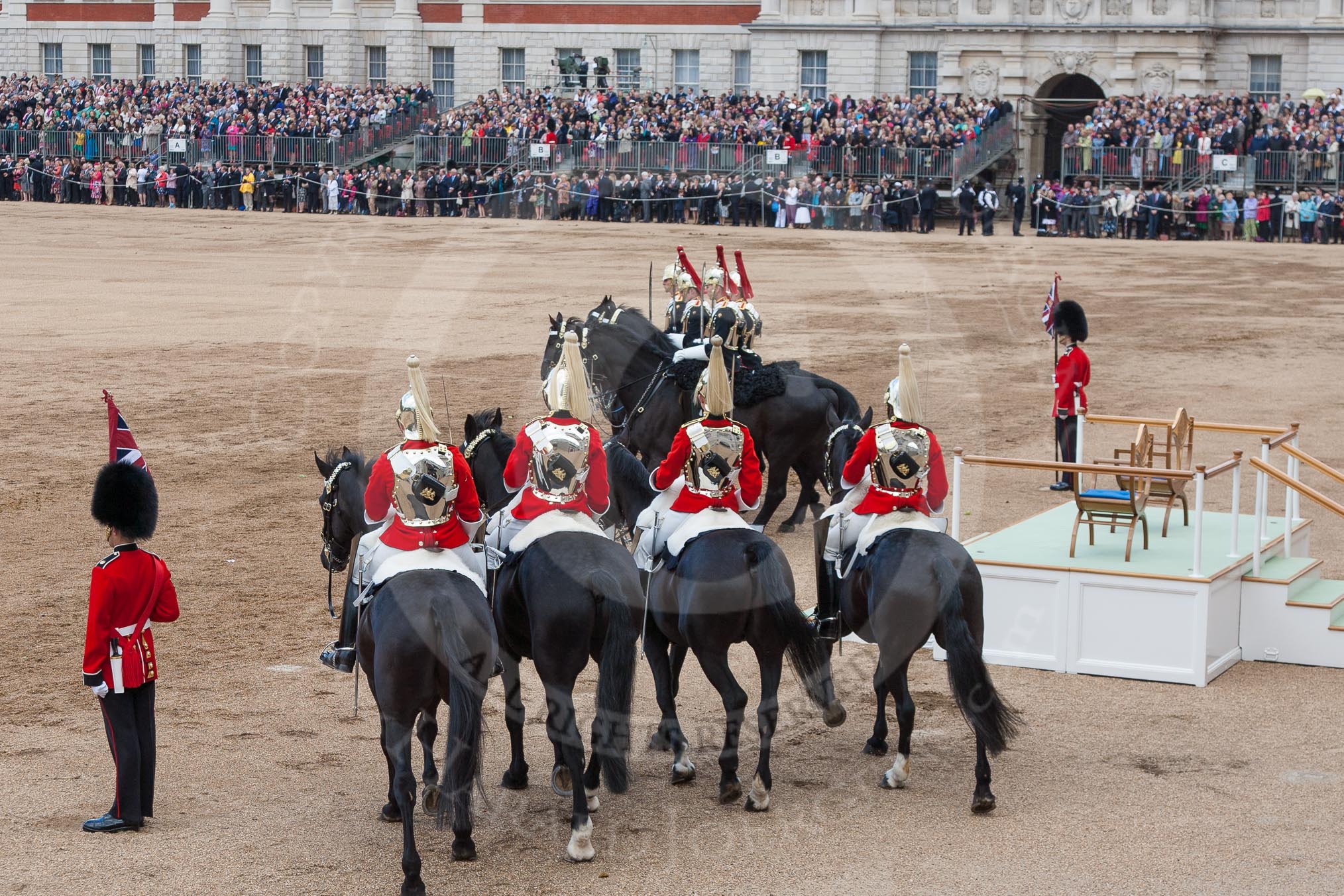 Trooping the Colour 2012: The March Off -  four troopers from The Life Guards, at the right of the saluting base the four troopers from The Blues and Royals..
Horse Guards Parade, Westminster,
London SW1,

United Kingdom,
on 16 June 2012 at 12:13, image #684