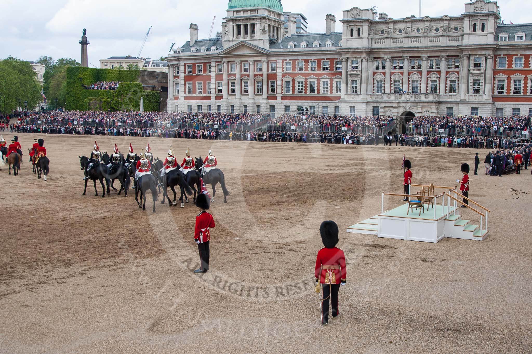 Trooping the Colour 2012: The March Off -  behind all the guardsmen a part of the Royal Procession..
Horse Guards Parade, Westminster,
London SW1,

United Kingdom,
on 16 June 2012 at 12:13, image #687