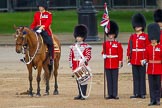 Trooping the Colour 2012: The Lone Drummer, Lance Sergeant Paul Blako, ready to play the Drummers Call. Next to him, on horseback, the Major of the Parade, Major Mark Lewis, Welsh Guards..
Horse Guards Parade, Westminster,
London SW1,

United Kingdom,
on 16 June 2012 at 11:15, image #288