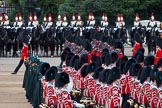 Trooping the Colour 2012: The Massed bands during the March Past. No. 5 Guard, 1st Battalion Irish Guards, marching to the left, with Irish Guards musicians (here the drummers and pipers) marching, as part os the Massed Bands, to the right..
Horse Guards Parade, Westminster,
London SW1,

United Kingdom,
on 16 June 2012 at 11:33, image #385