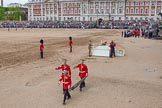 Trooping the Colour 2012: After the parade - stretcher bearers removing a stretcher, behind the saluting base is disassembled..
Horse Guards Parade, Westminster,
London SW1,

United Kingdom,
on 16 June 2012 at 12:17, image #697