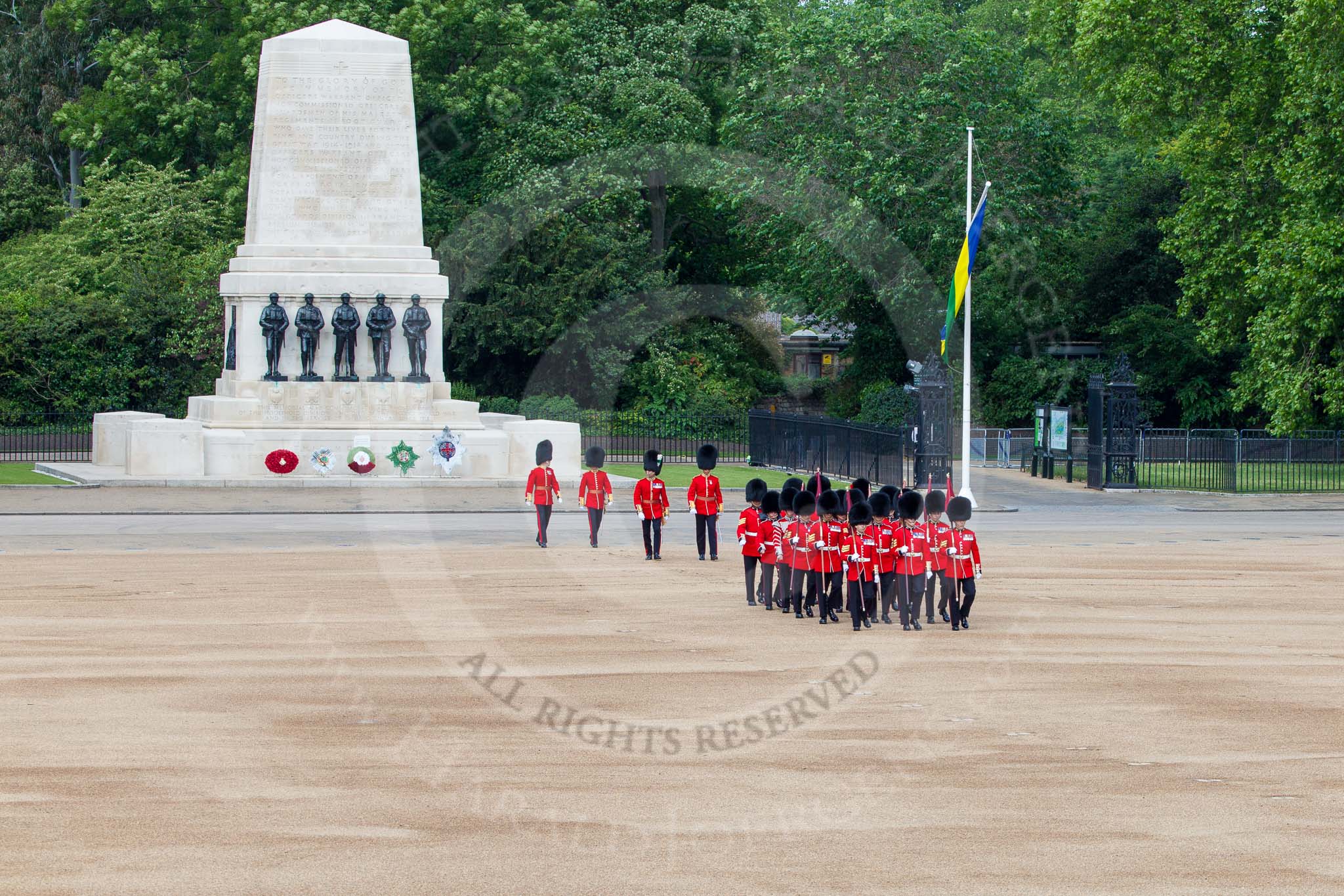 The Colonel's Review 2013: The 'Keepers of the Ground', guardsmen bearing marker flags for their respective regiments, turning towards Horse Guards Parade at the Guards Memorial..
Horse Guards Parade, Westminster,
London SW1,

United Kingdom,
on 08 June 2013 at 09:53, image #26