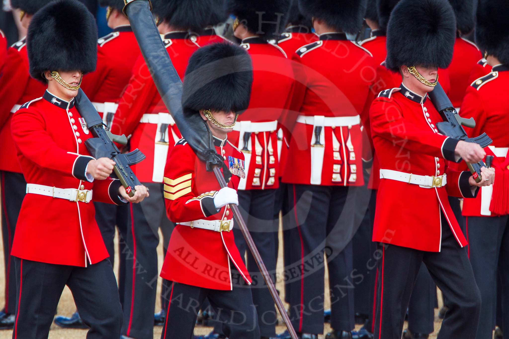 The Colonel's Review 2013: Colour Sergeant R J Heath, carrying the Colour and two sentries marching to their position on Horse Guards Parade..
Horse Guards Parade, Westminster,
London SW1,

United Kingdom,
on 08 June 2013 at 10:31, image #129