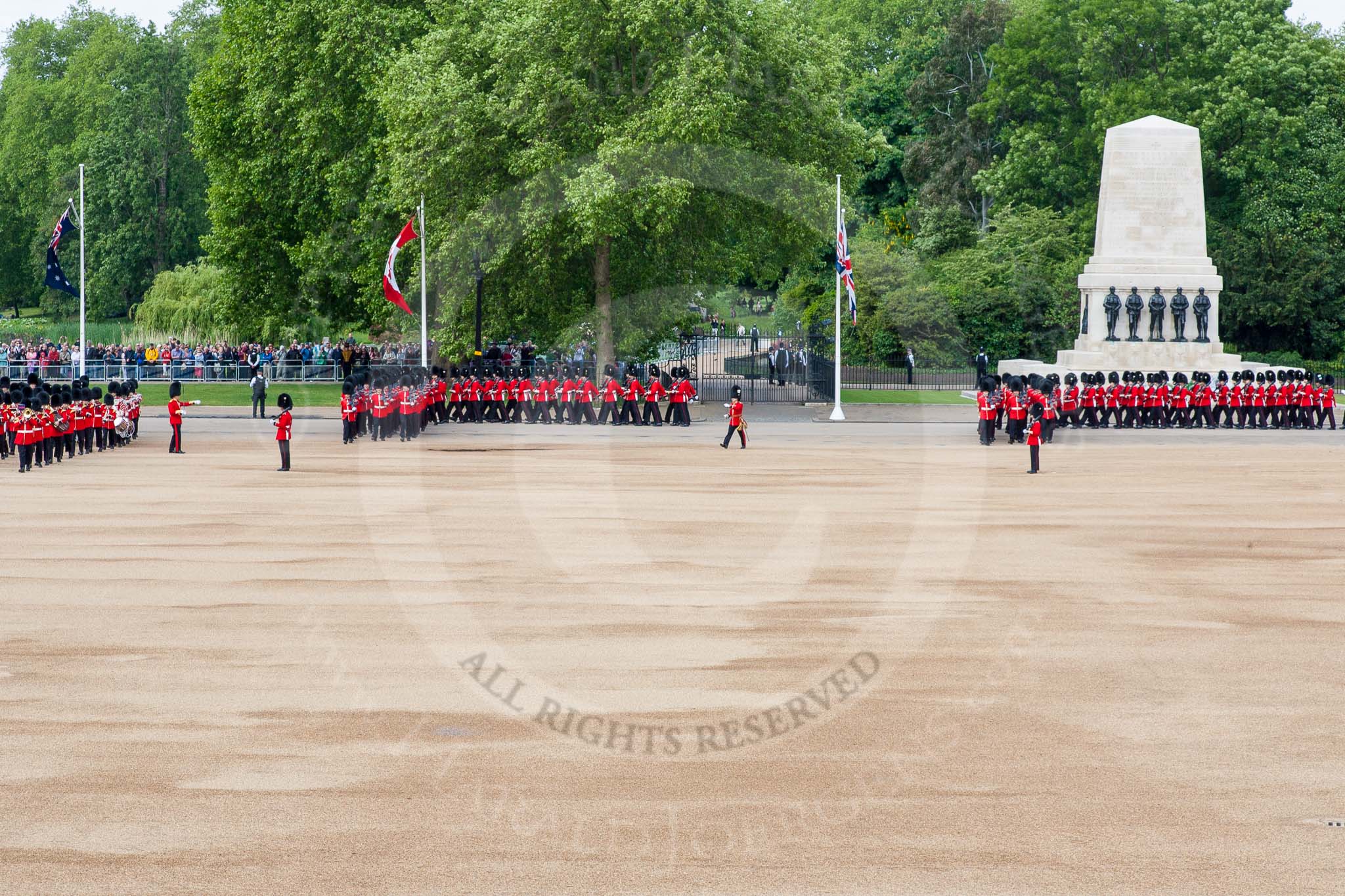 The Colonel's Review 2013: No. 1 Guard (Escort for the Colour),1st Battalion Welsh Guards and No.2 Guard, 1st Battalion Welsh Guards. Behind them spectators watching from St James's Park..
Horse Guards Parade, Westminster,
London SW1,

United Kingdom,
on 08 June 2013 at 10:32, image #131