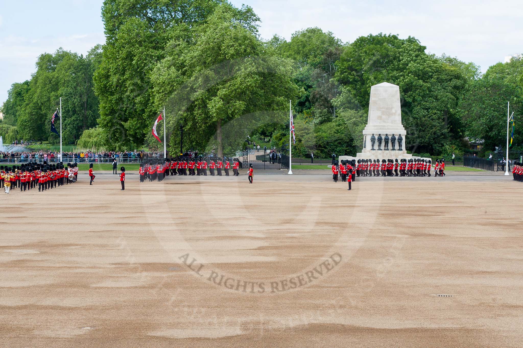 The Colonel's Review 2013: The Band of the Welsh Guards, No. 1 Guard (Escort for the Colour),1st Battalion Welsh Guards and No.2 Guard, 1st Battalion Welsh Guards. Behind them spectators watching from St James's Park..
Horse Guards Parade, Westminster,
London SW1,

United Kingdom,
on 08 June 2013 at 10:32, image #132