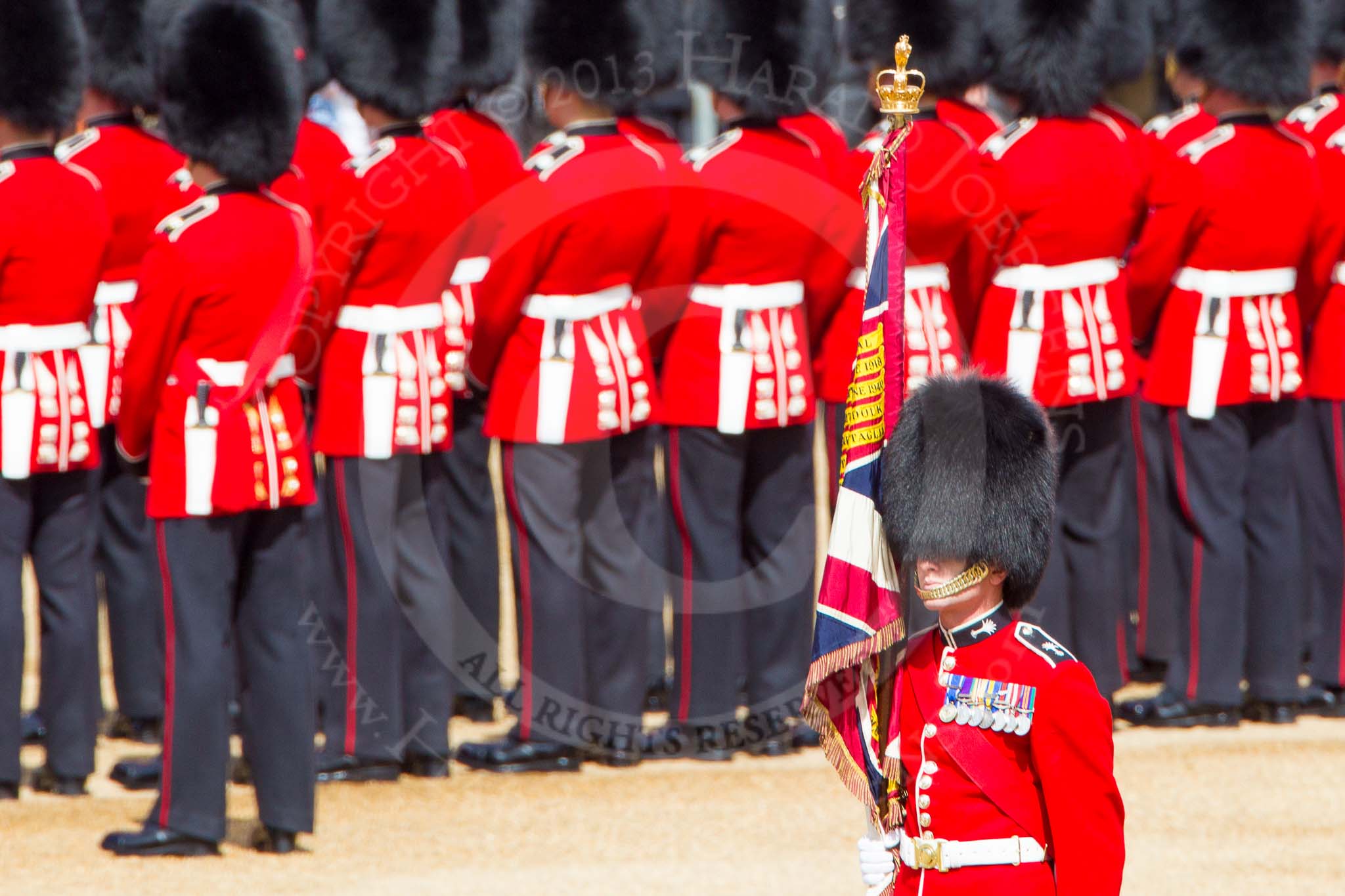 The Colonel's Review 2013: The Escort Party, Colour Sergeant R J Heath, holding the Colour on his right side Welsh Guards..
Horse Guards Parade, Westminster,
London SW1,

United Kingdom,
on 08 June 2013 at 10:34, image #158