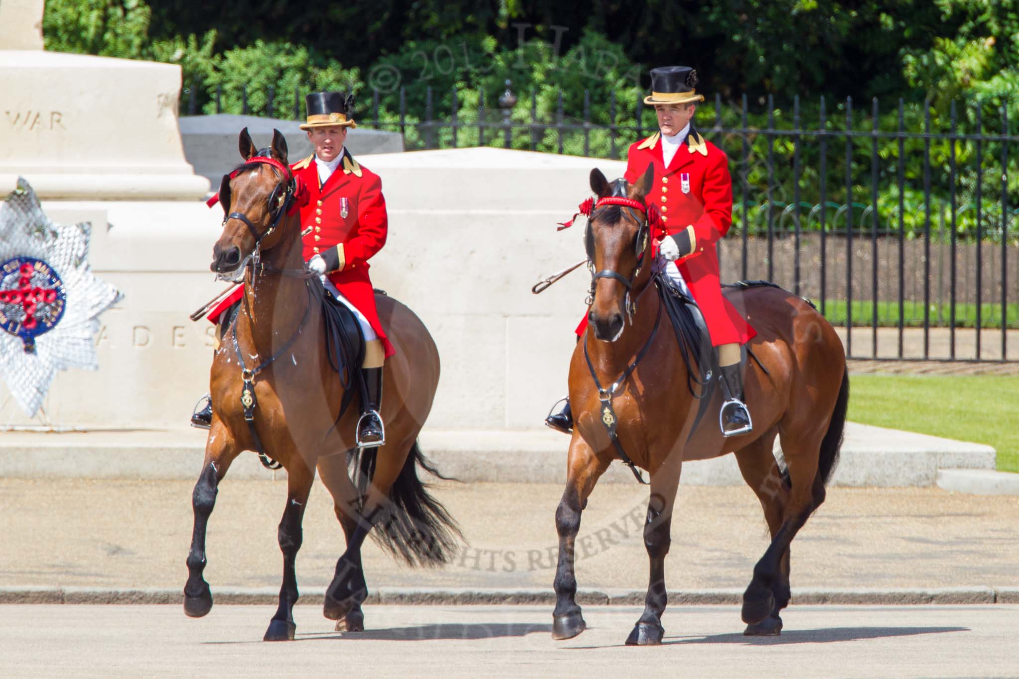 The Colonel's Review 2013: Two grooms leading the group of carriages with members of the Royal Family from Buckingham Palace to Horse Guards Building..
Horse Guards Parade, Westminster,
London SW1,

United Kingdom,
on 08 June 2013 at 10:50, image #219