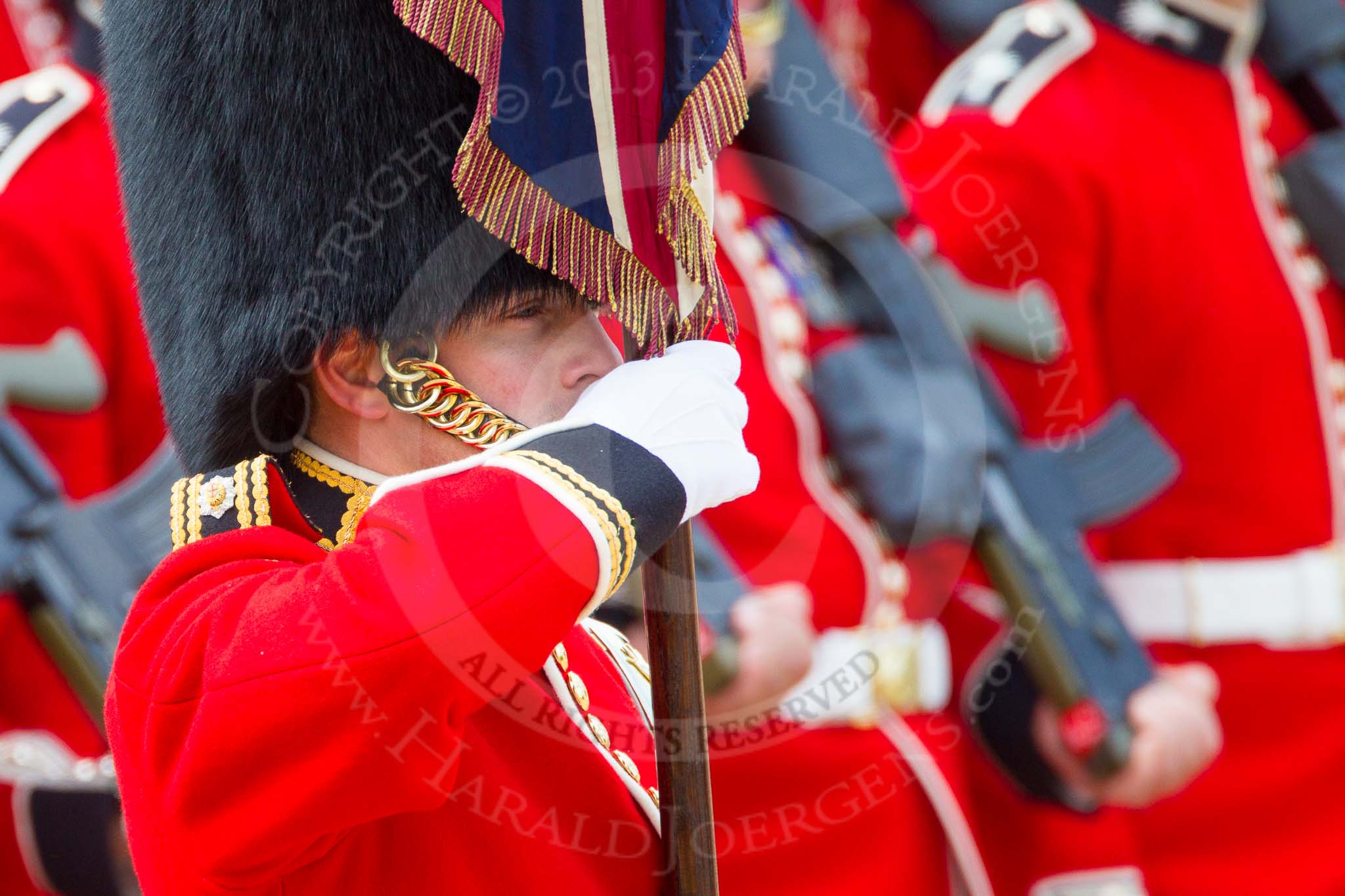 The Colonel's Review 2013: Close-up of the Ensign, Second Lieutenant Joel Dinwiddle, carrying the Colour during the March Past..
Horse Guards Parade, Westminster,
London SW1,

United Kingdom,
on 08 June 2013 at 11:34, image #635