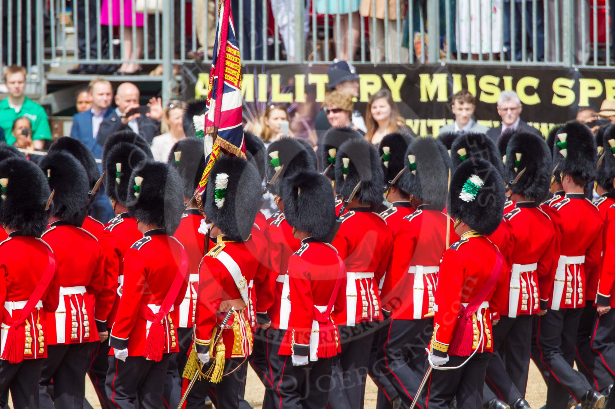 The Colonel's Review 2013: No. 1 Guard, the Escort to the Colour),1st Battalion Welsh Guards, with the Ensign carrting the Colour behind the lines of guardsmen, during the March Past..
Horse Guards Parade, Westminster,
London SW1,

United Kingdom,
on 08 June 2013 at 11:38, image #663