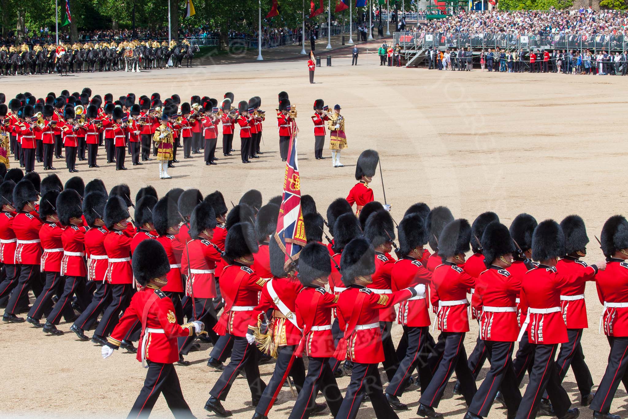 The Colonel's Review 2013: No. 1 Guard, the Escort to the Colour,1st Battalion Welsh Guards, during the March Past in Quick Time. A closer look from the rear..
Horse Guards Parade, Westminster,
London SW1,

United Kingdom,
on 08 June 2013 at 11:43, image #693