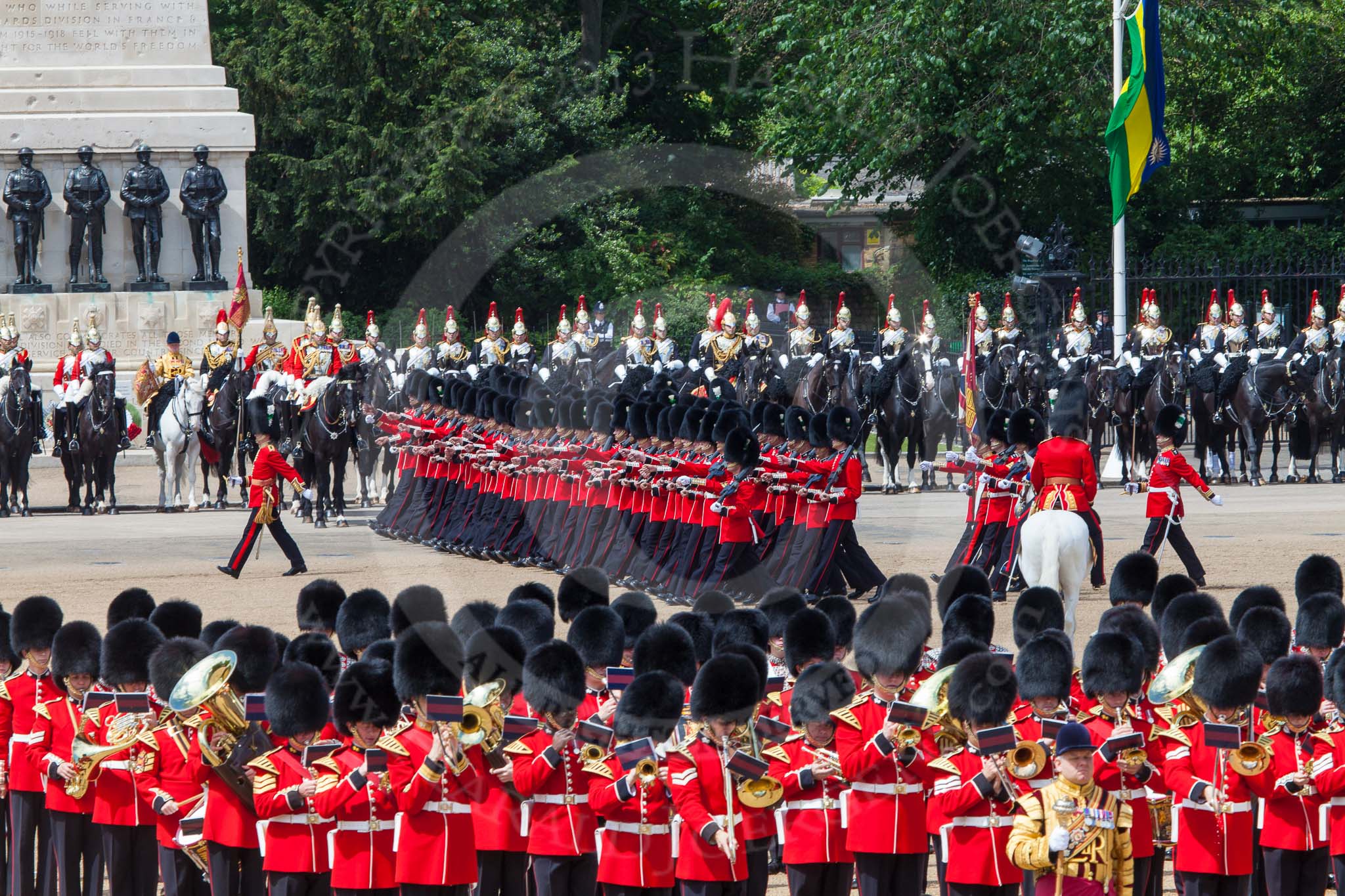 The Colonel's Review 2013: The March Past in Quick Time. The guards are marching beween the Massed Bands, in front, and the Life Guards and The Blues and Royals behind them..
Horse Guards Parade, Westminster,
London SW1,

United Kingdom,
on 08 June 2013 at 11:47, image #707