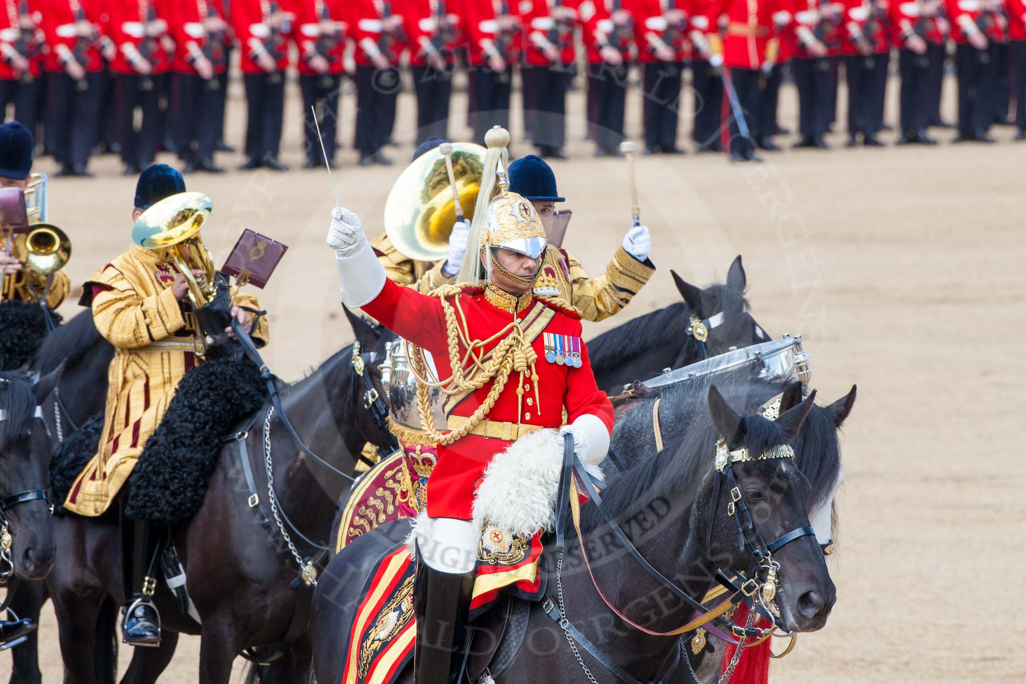 The Colonel's Review 2013: The Mounted Bands of the Household Cavalry during the Ride Past. The Director of Music of the Household Cavalry, Major Paul Wilman, The Life Guards..
Horse Guards Parade, Westminster,
London SW1,

United Kingdom,
on 08 June 2013 at 11:55, image #751