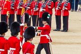 The Colonel's Review 2013: The Ensign, Second Lieutenant Joel Dinwiddle, marches foreward with the Colour, whilst Regimental Sergeant Major, WO1 Martin Topps, Welsh Guards, returns to the Escort to the Colour..
Horse Guards Parade, Westminster,
London SW1,

United Kingdom,
on 08 June 2013 at 11:20, image #533